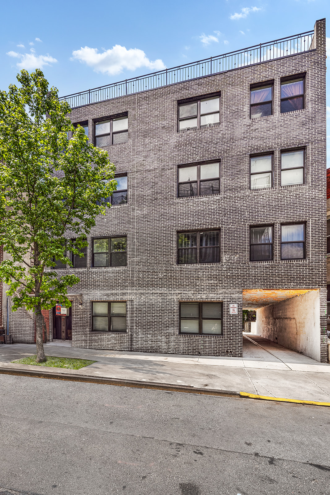 422 East 31st Street Brooklyn, NY 11226 - Photo 1 of 16 a bricked building with multiple windows