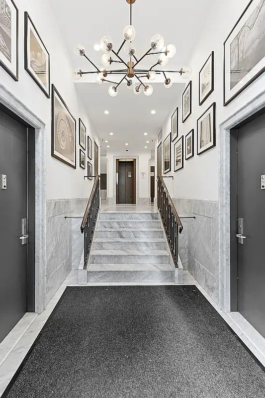 44 East End Avenue, Unit TH1 Manhattan, NY 10028 - Photo 10 of 14 a view of entryway and hall with wooden floor