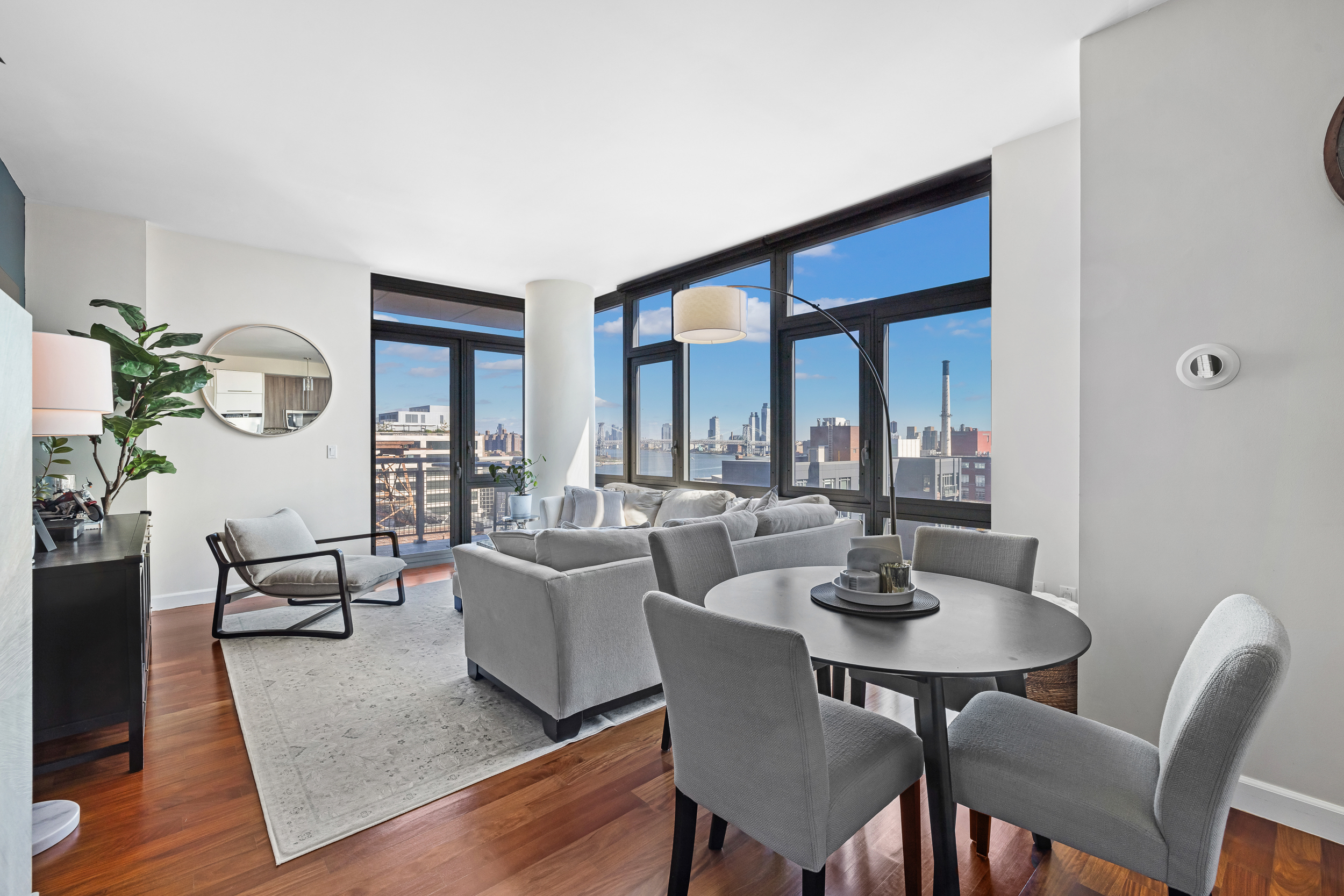 100 Jay Street, Unit 15C Brooklyn, NY 11201 - Photo 2 of 19 a view of a dining room with furniture and wooden floor