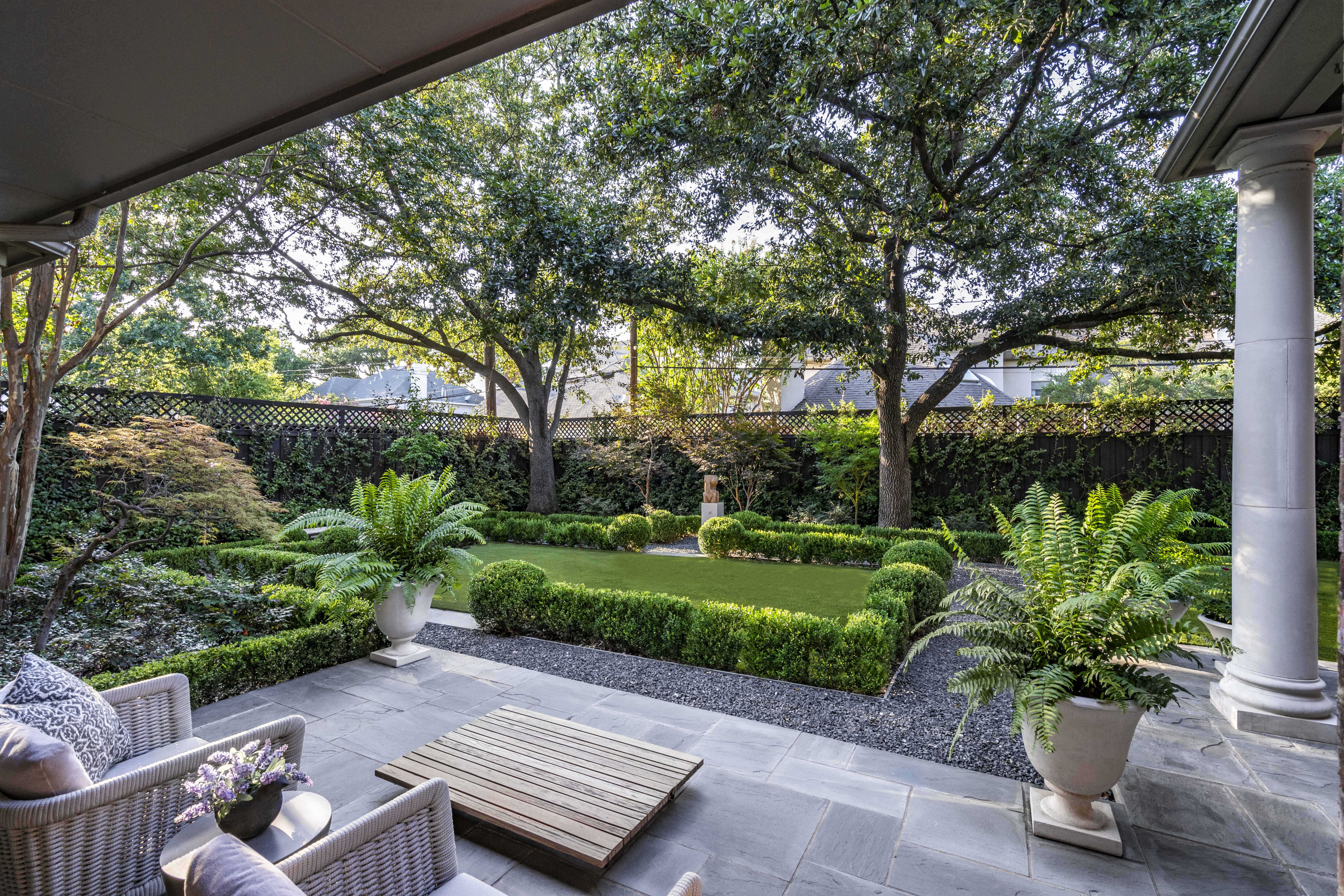 6607 Meadow Road Dallas, TX 75230 - Photo 29 of 32 a view of a backyard with garden and plants