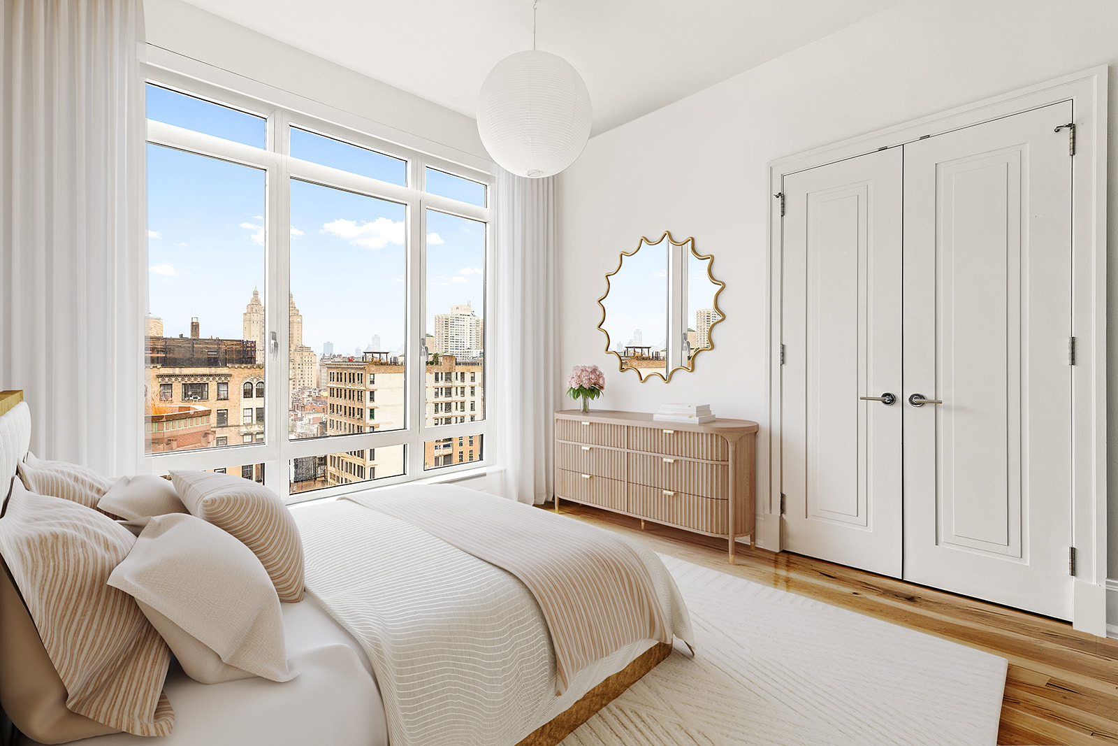 205 West 76th Street, Unit PH1F Manhattan, NY 10023 - Photo 8 of 18 a bedroom with a bed and a large window