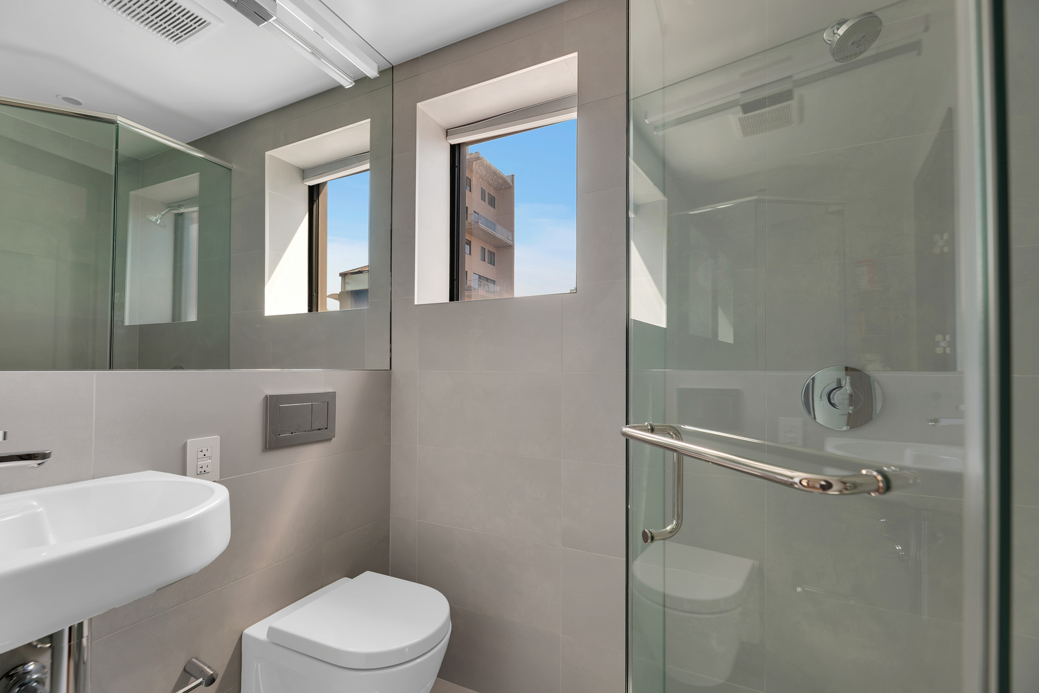 440 West 20th Street Manhattan, NY 10011 - Photo 13 of 20 a white toilet sitting next to a bathroom sink