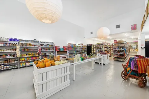 a view of an empty room with a fireplace