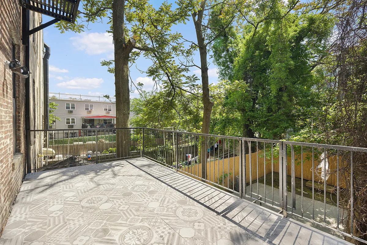 1242 Putnam Avenue, Unit 2 Brooklyn, NY 11221 - Photo 7 of 8 a balcony with a view of lake