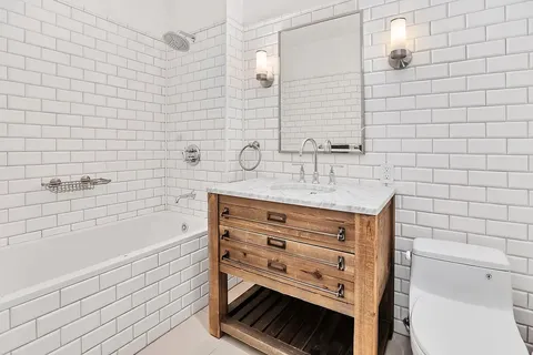a bathroom with a sink and a bathtub