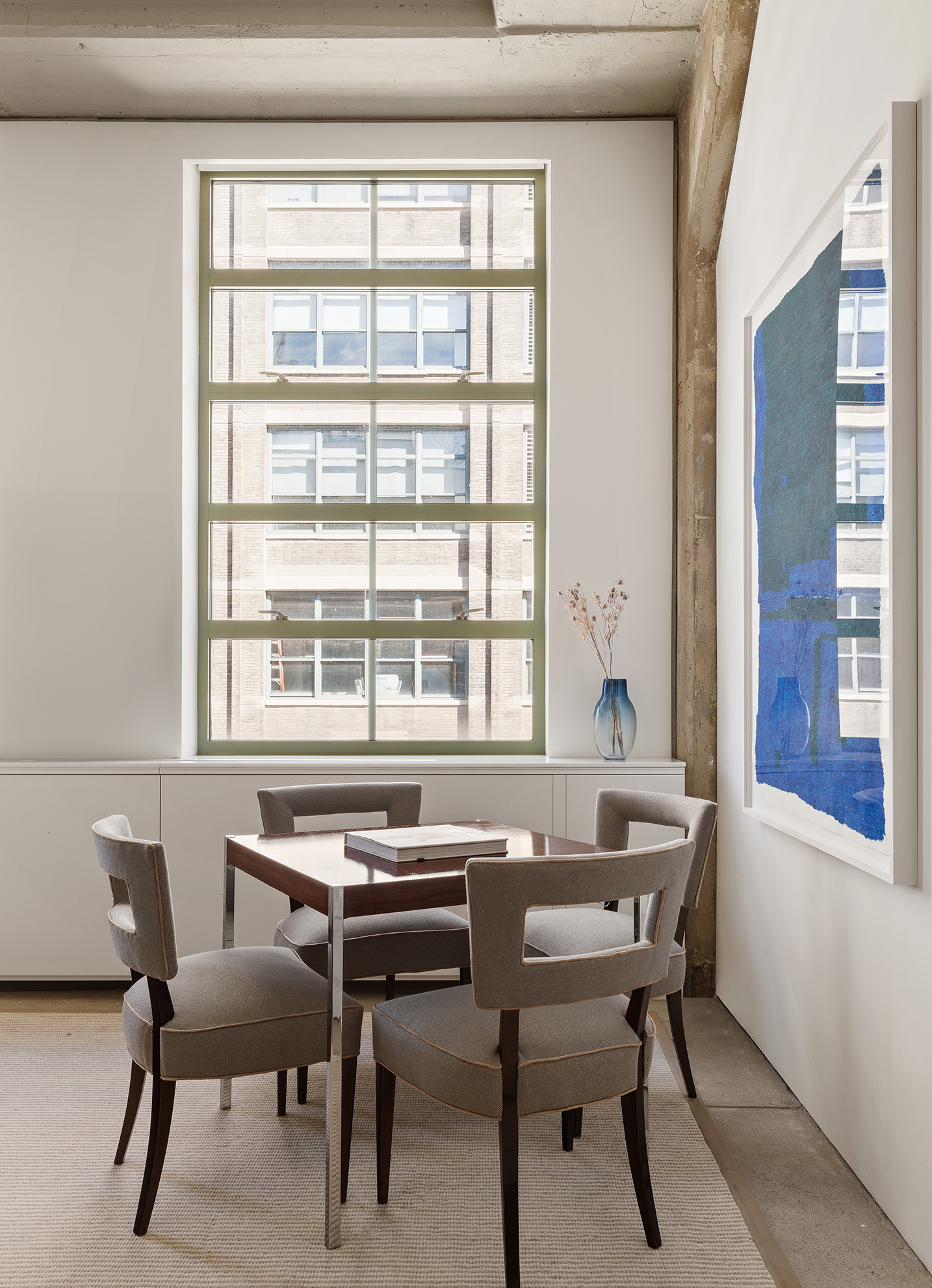 195 Hudson Street, Unit 6A Manhattan, NY 10013 - Photo 9 of 15 a view of a workspace with furniture and a window