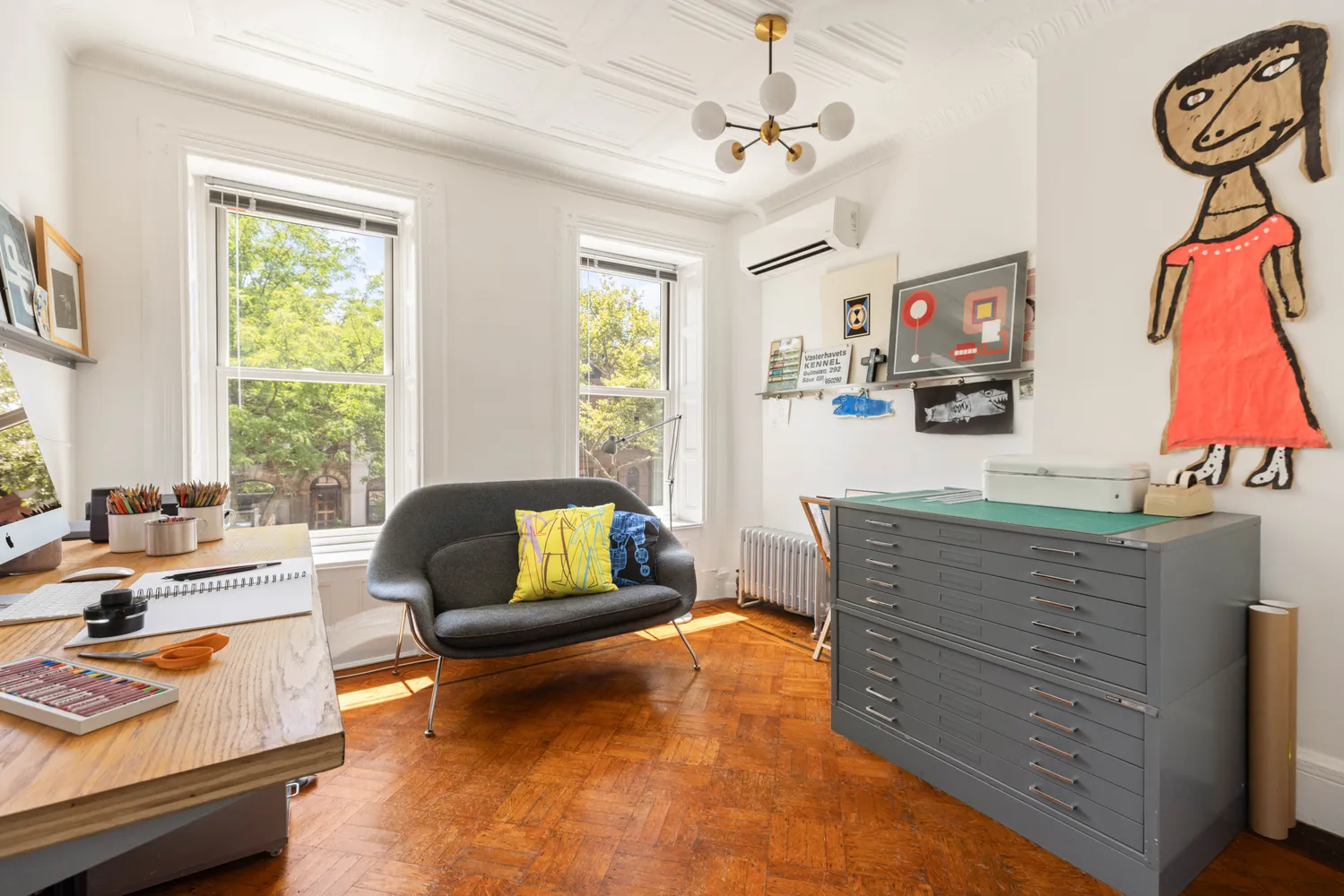 a bedroom with furniture and a window
