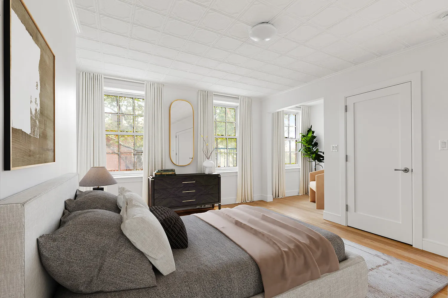 a bedroom with a bed and a couch