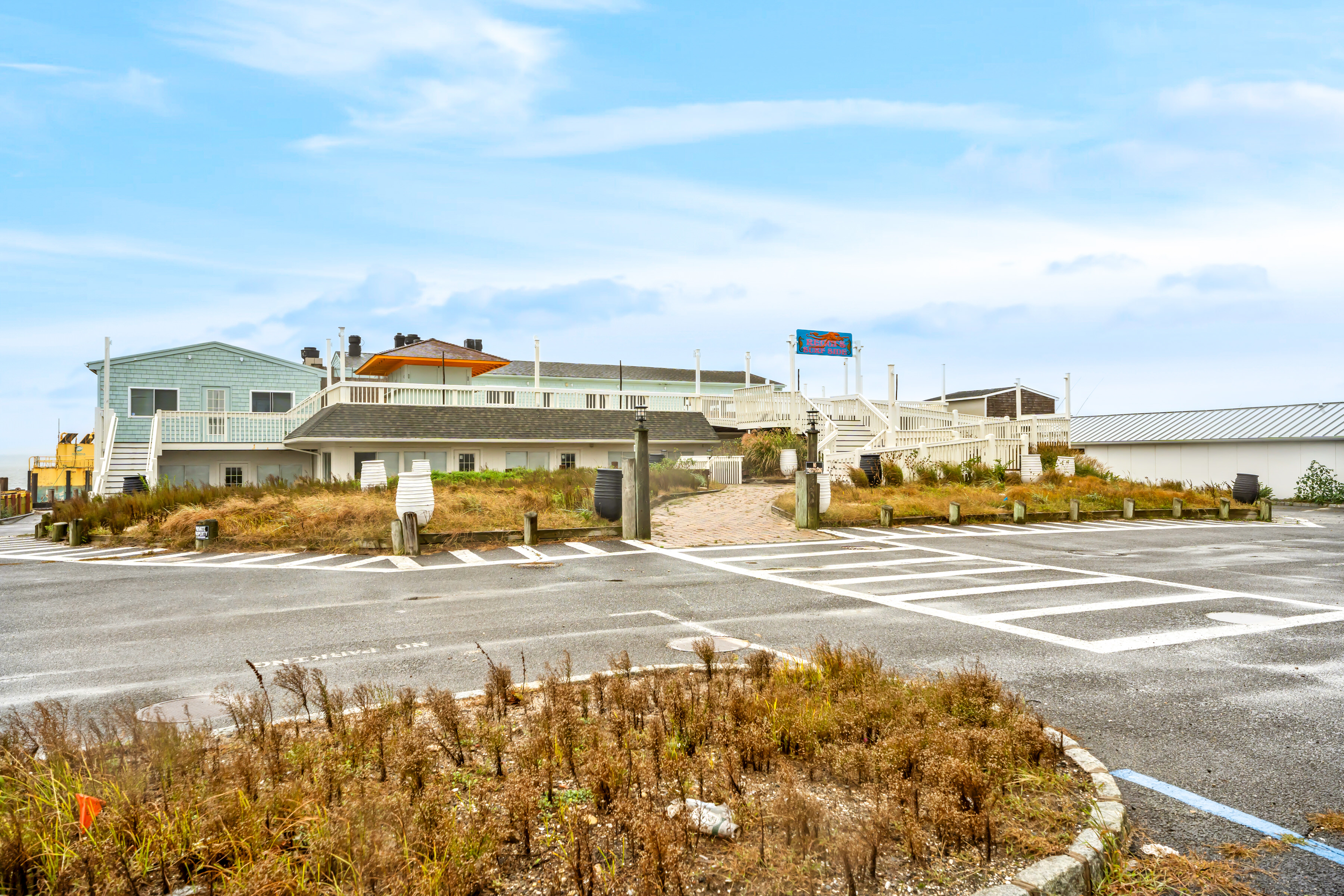 363 Beach Road Hampton Bays, NY 11959 - Photo 9 of 26 a view of a city street from a building