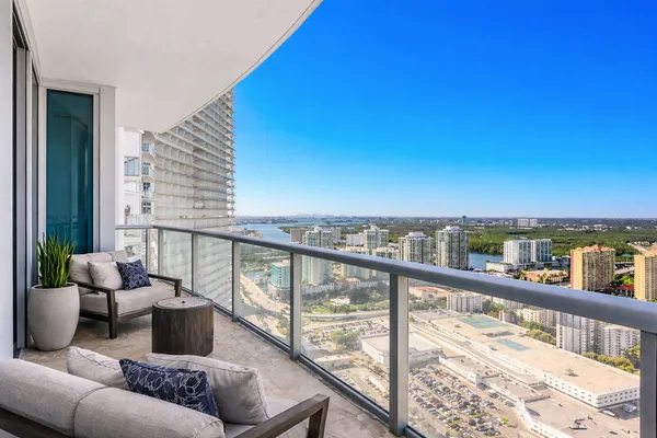 a view of a balcony with city view