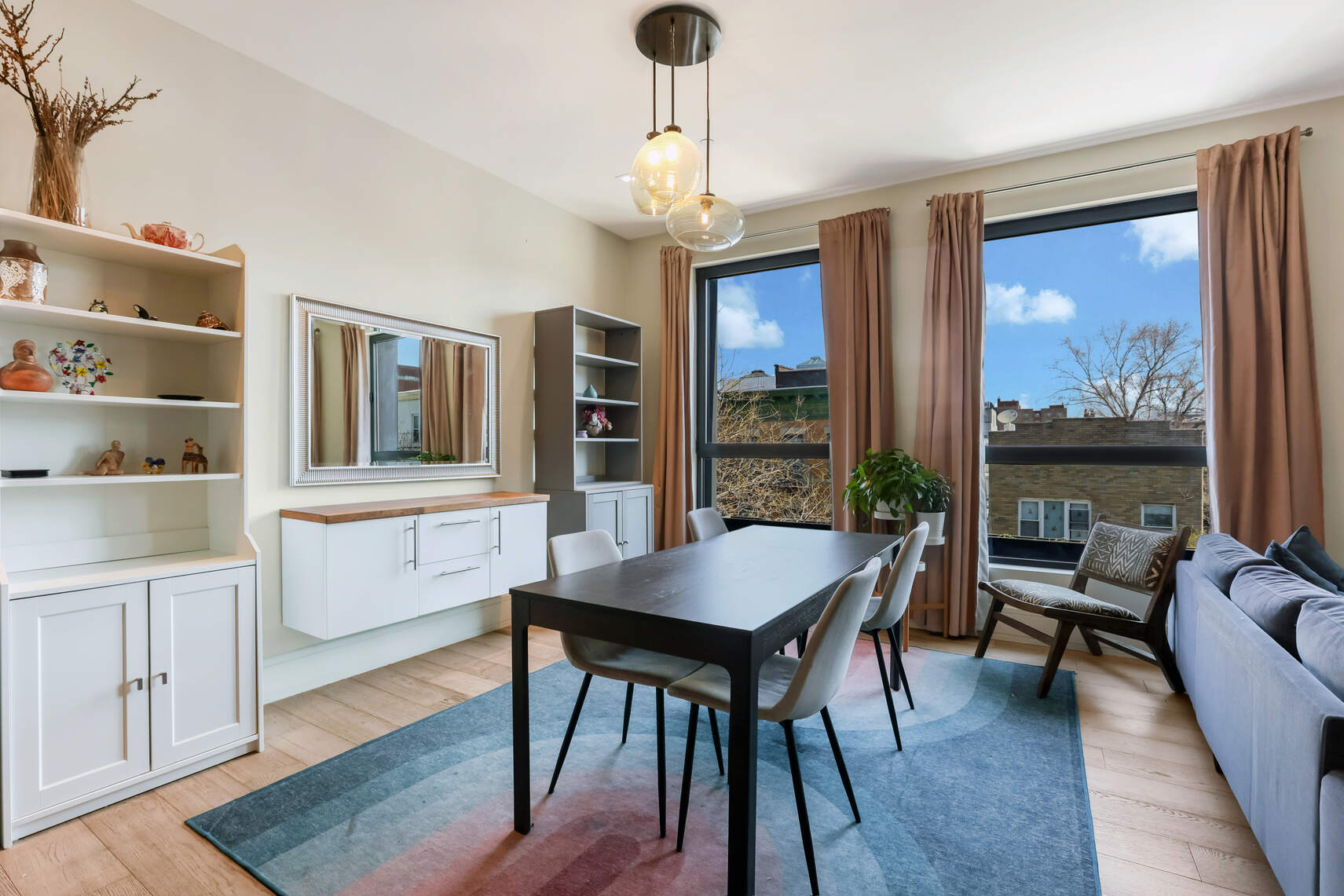 288 19th Street, Unit 3 Brooklyn, NY 11215 - Photo 3 of 26 a dining room with wooden floor and large windows