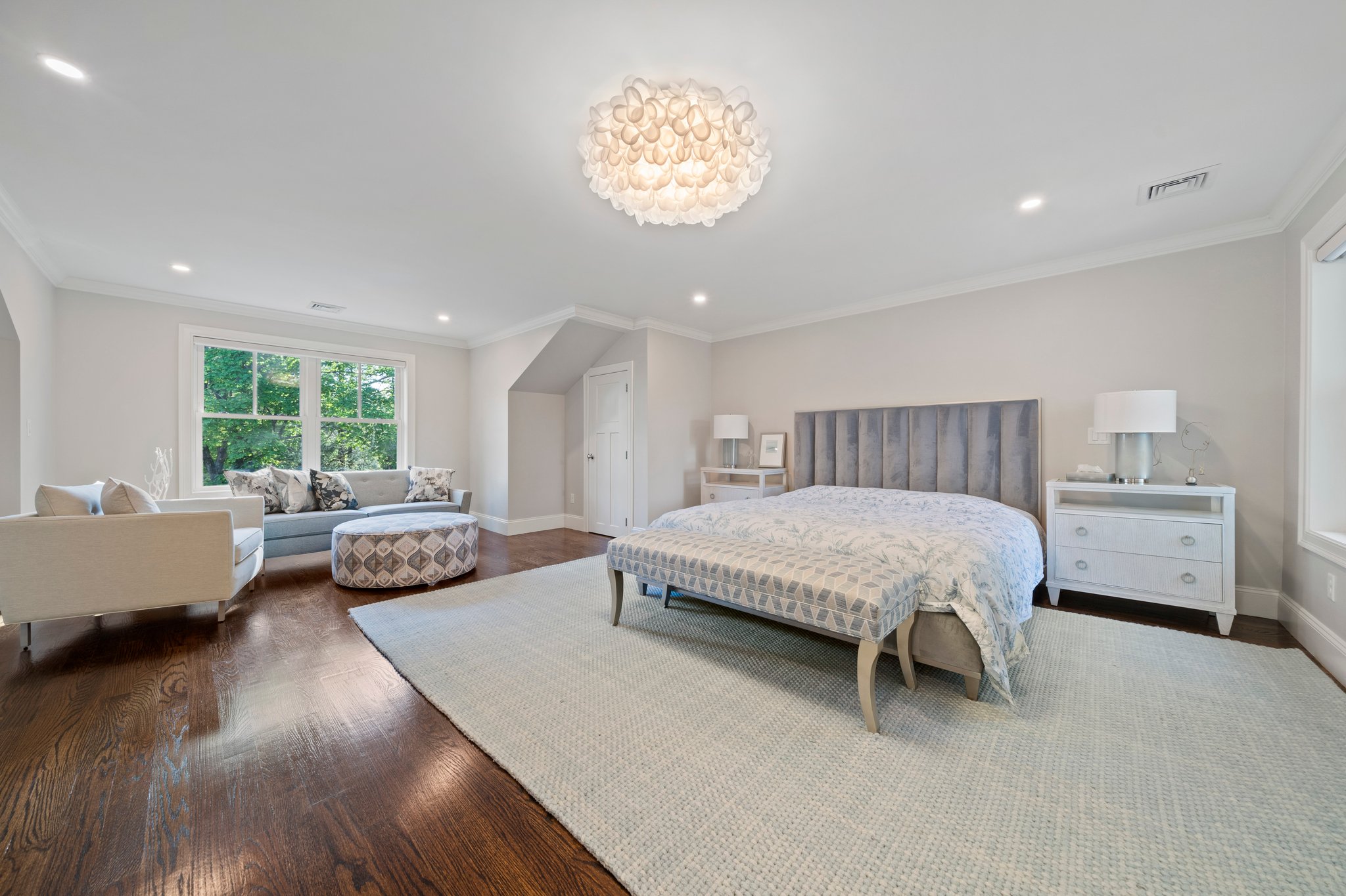 241 Lowell Road Wellesley, MA 02481 - Photo 37 of 85 a spacious bedroom with a bed and a large window