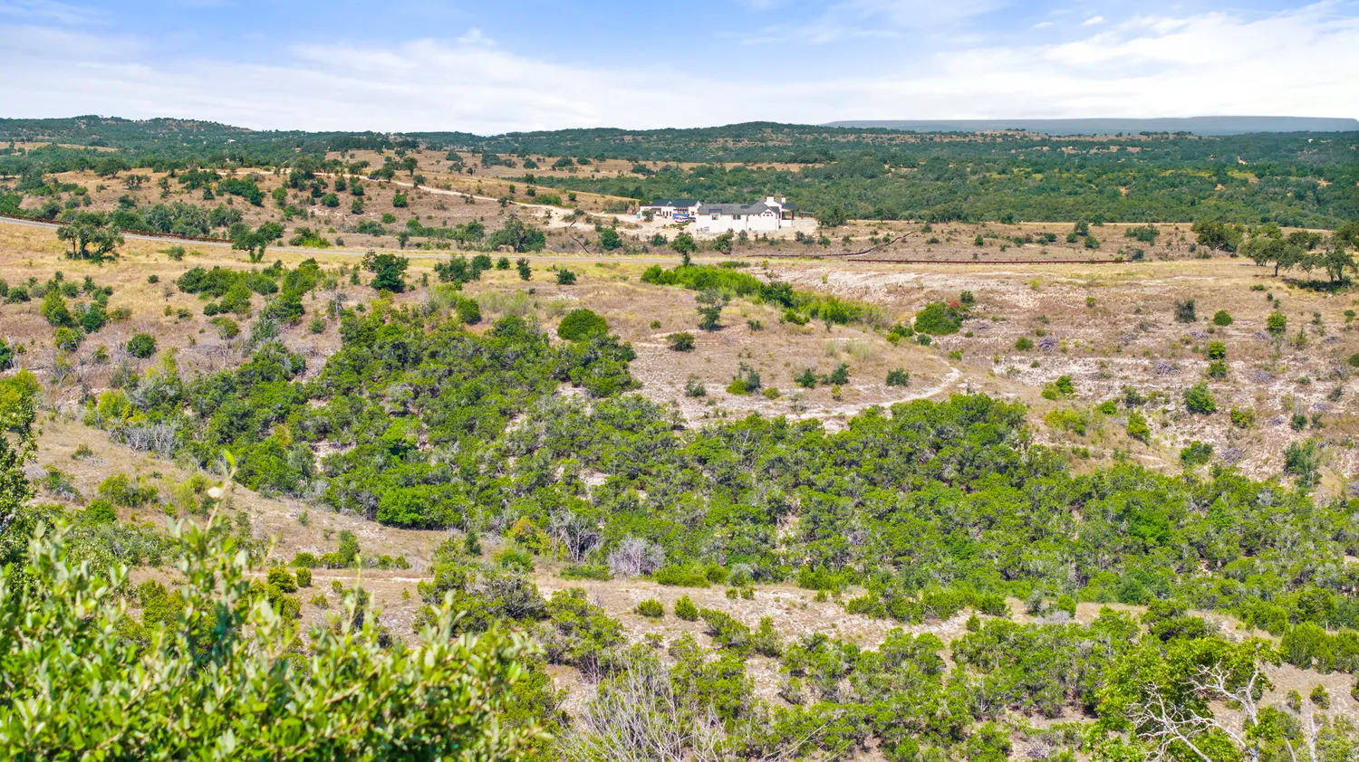a view of a city with mountain