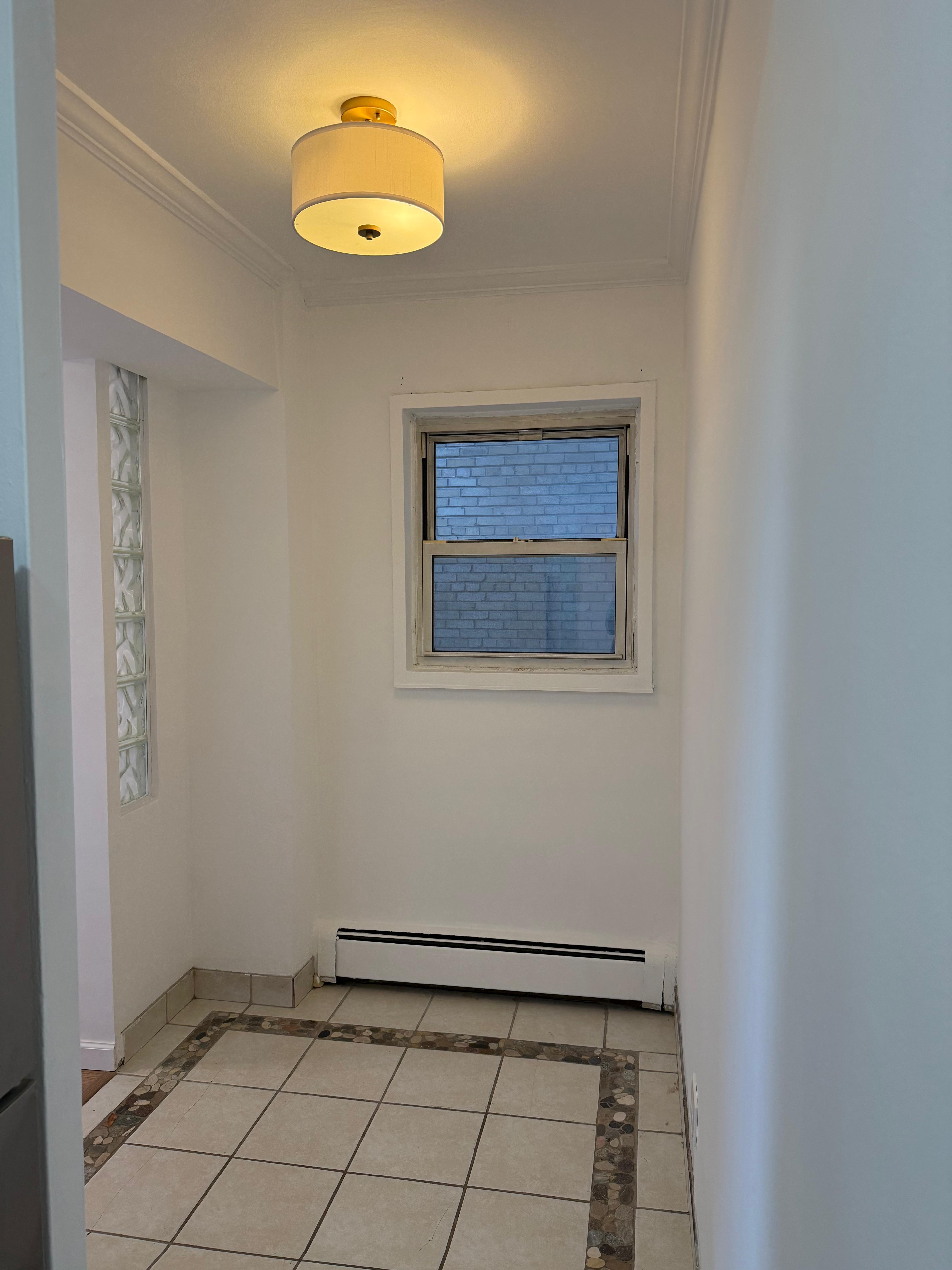 40 Sutton Place, Unit 7A Manhattan, NY 10022 - Photo 9 of 11 a view of an empty room