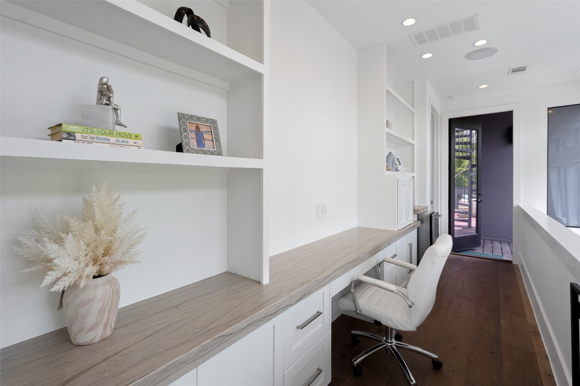 1207 East 13th Street Austin, TX 78702 - Photo 18 of 39 a view of workspace with wooden floor