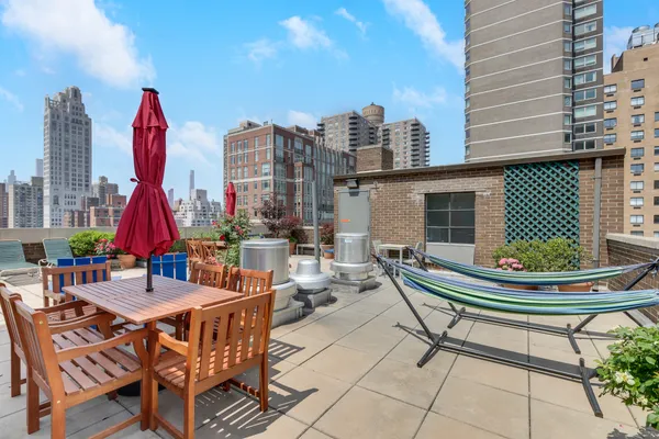 an outdoor view of a building with glass windows and door