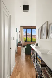 a kitchen with a cabinets and a table