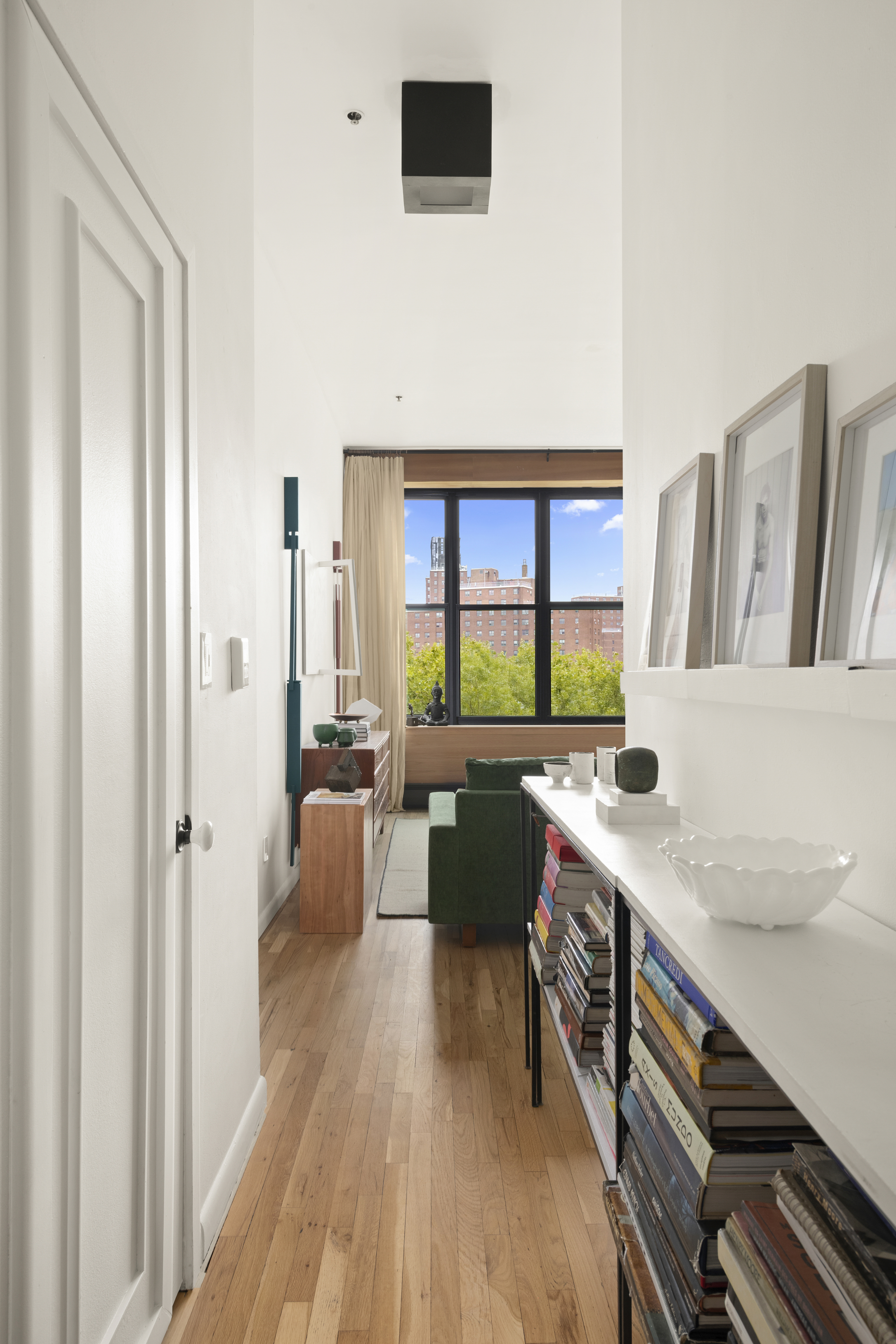 372 Dekalb Avenue, Unit 6E Brooklyn, NY 11205 - Photo 2 of 16 a kitchen with a cabinets and a table