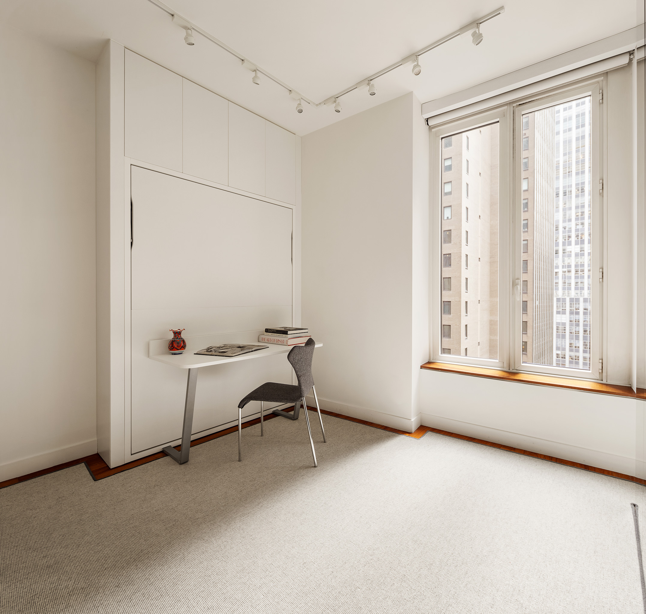 15 William Street, Unit 22H Manhattan, NY 10005 - Photo 9 of 20 a view of a room with window and a ceiling fan