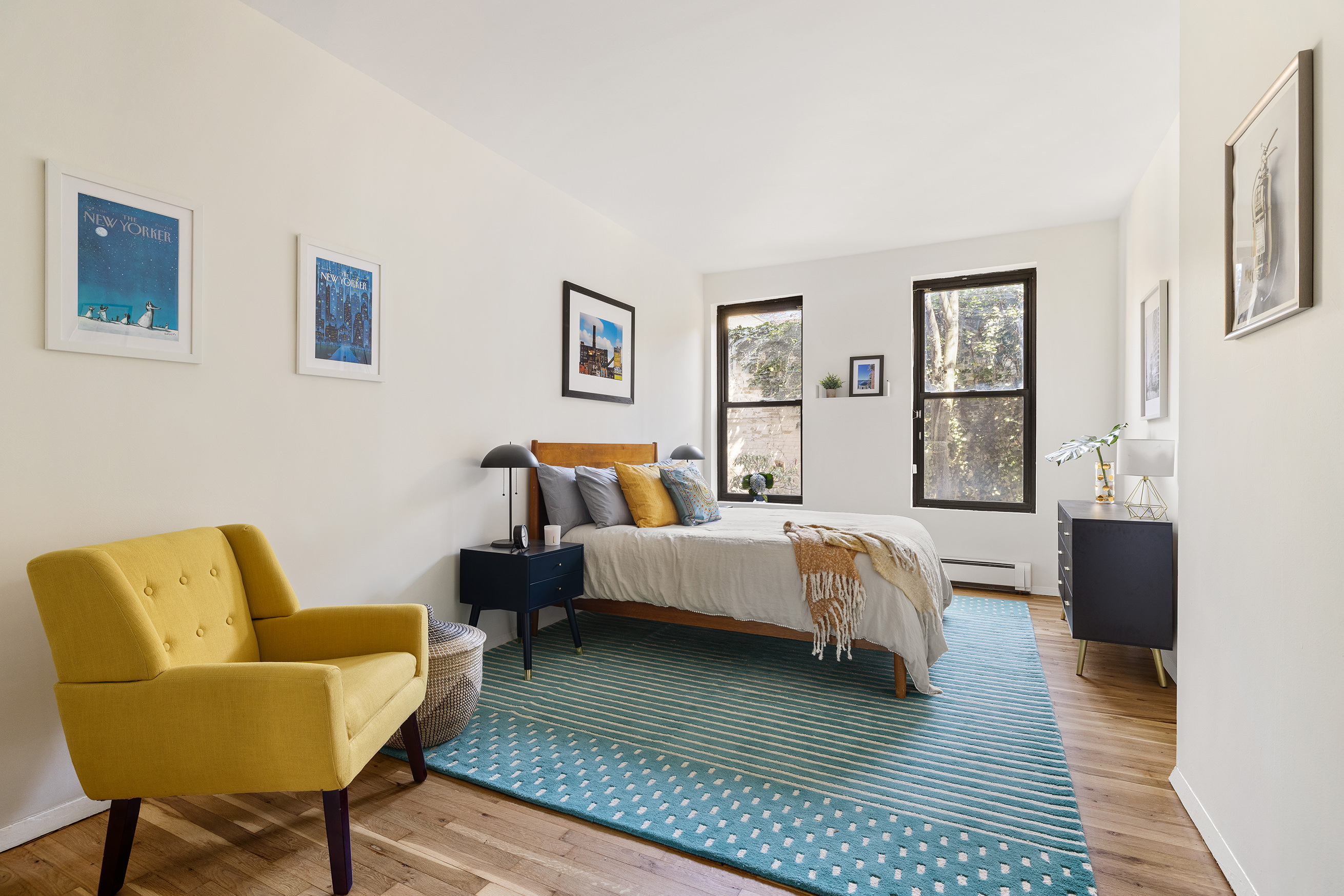 195 Garfield Place, Unit 1L Brooklyn, NY 11215 - Photo 7 of 17 a bed room with bed and a couch