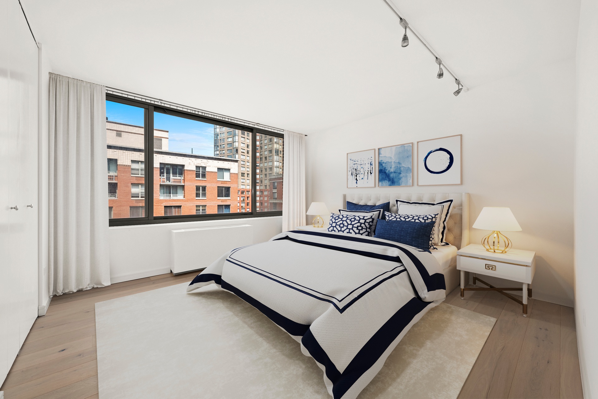 2 South End Avenue, Unit 8C Manhattan, NY 10280 - Photo 5 of 6 a bed room with a bed and a window