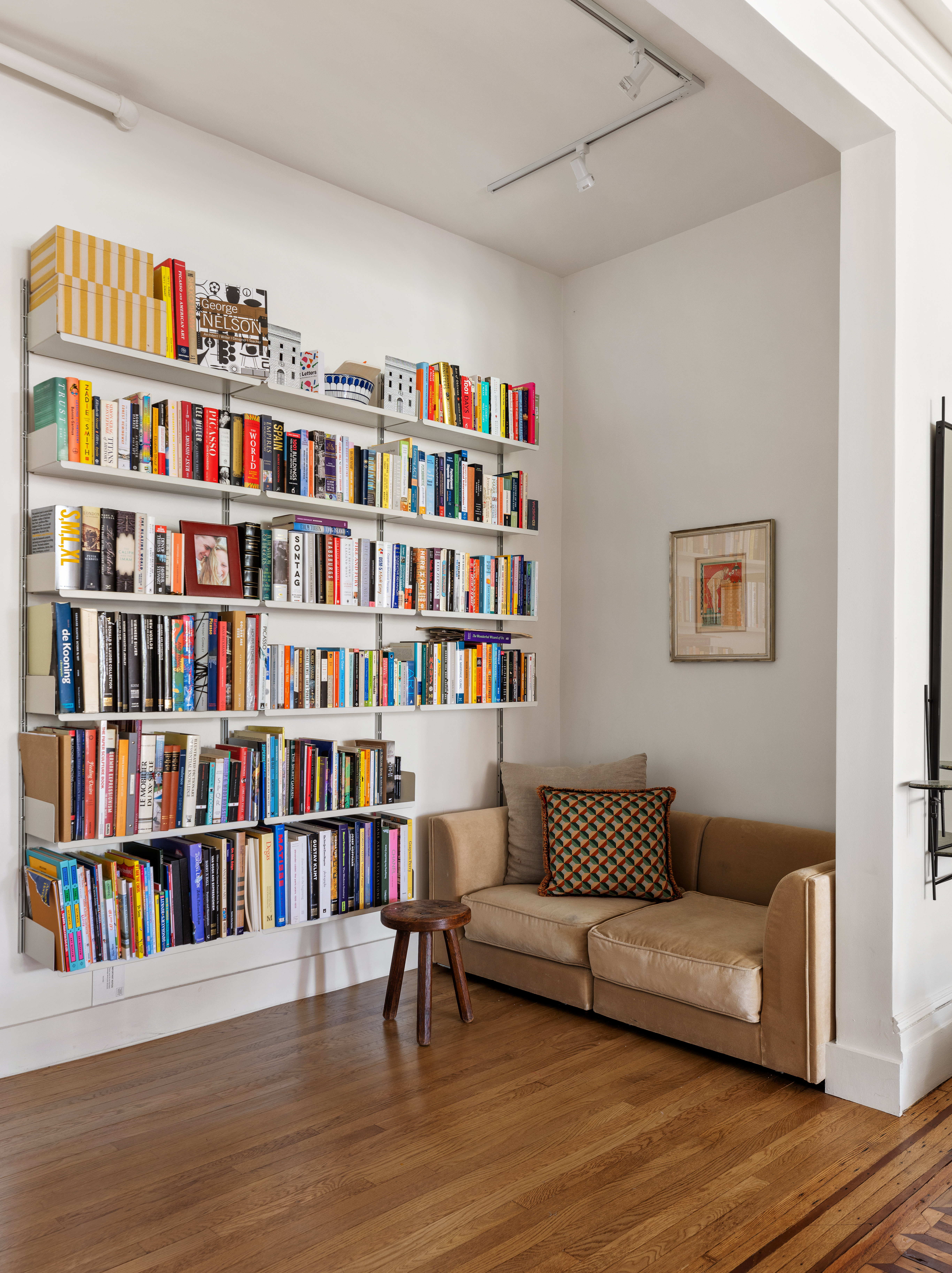 266 Henry Street, Unit B Brooklyn, NY 11201 - Photo 4 of 17 a living room with furniture and a book shelf