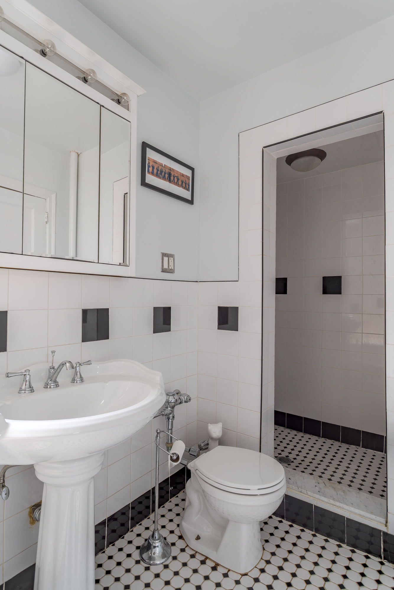 35-06 88th Street, Unit 5DD Queens, NY 11372 - Photo 15 of 18 a bathroom with a sink toilet and shower