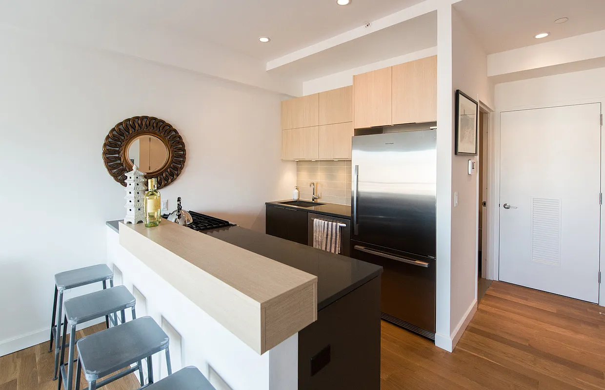 500 Sterling Place, Unit 5B Brooklyn, NY 11238 - Photo 2 of 13 a kitchen with a refrigerator and a sink