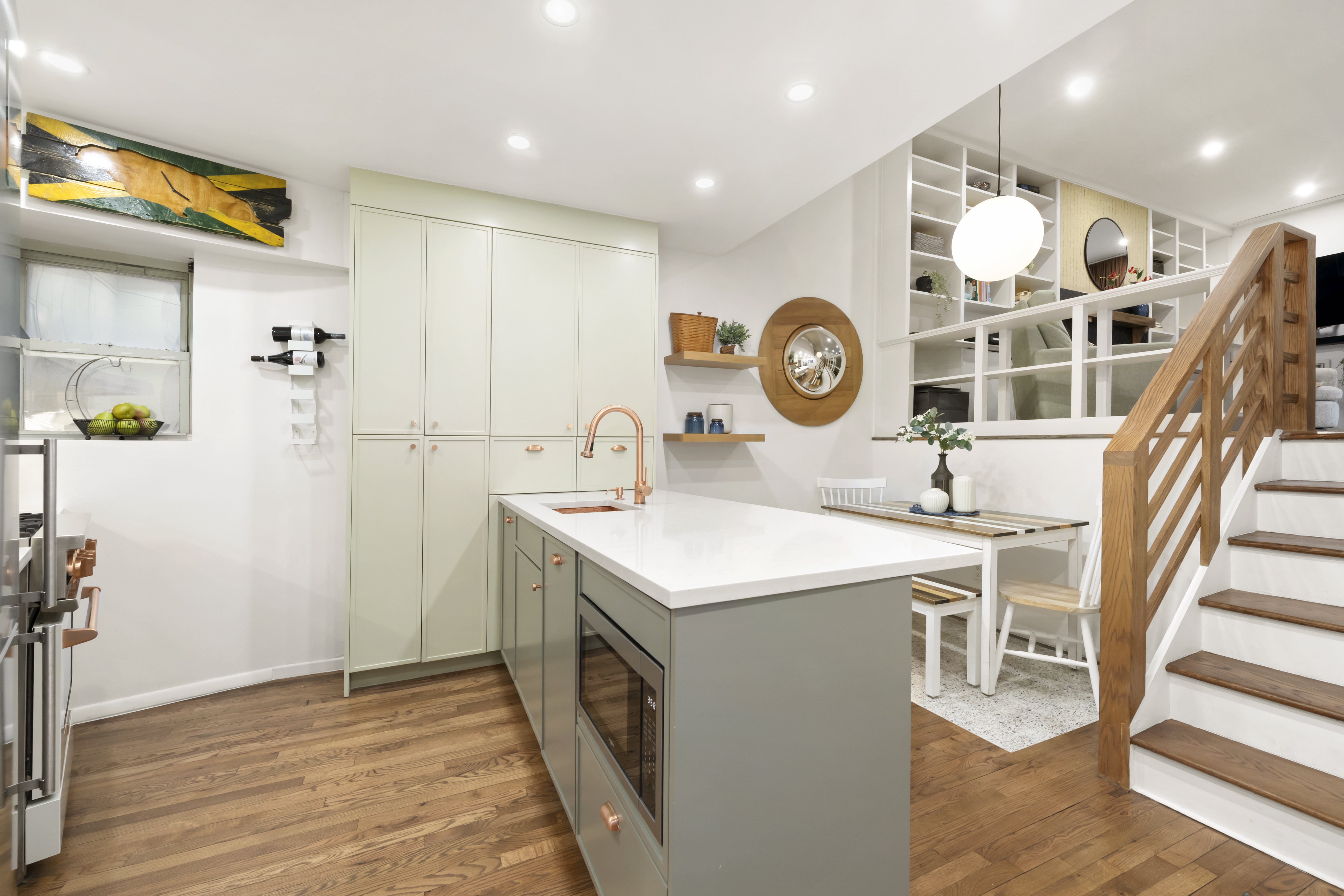 49 East 12th Street, Unit 4A Manhattan, NY 10003 - Photo 3 of 6 a hall with a stove a sink and a clock