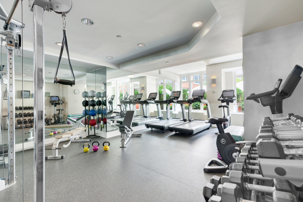 205 East 85th Street, Unit G10 Manhattan, NY 10028 - Photo 25 of 27 a gym room with lots of gym equipment