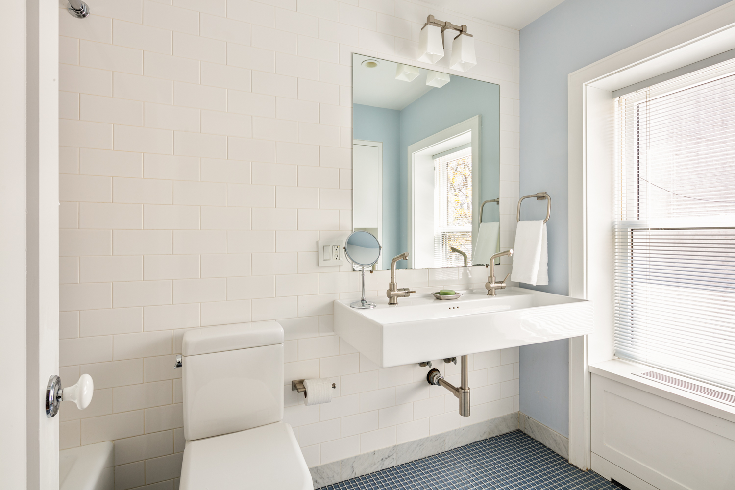 380 3rd Street, Unit PARLOR Brooklyn, NY 11215 - Photo 17 of 19 a bathroom with a sink toilet and mirror