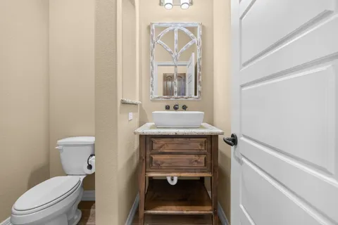 a bathroom with a bathtub and a sink