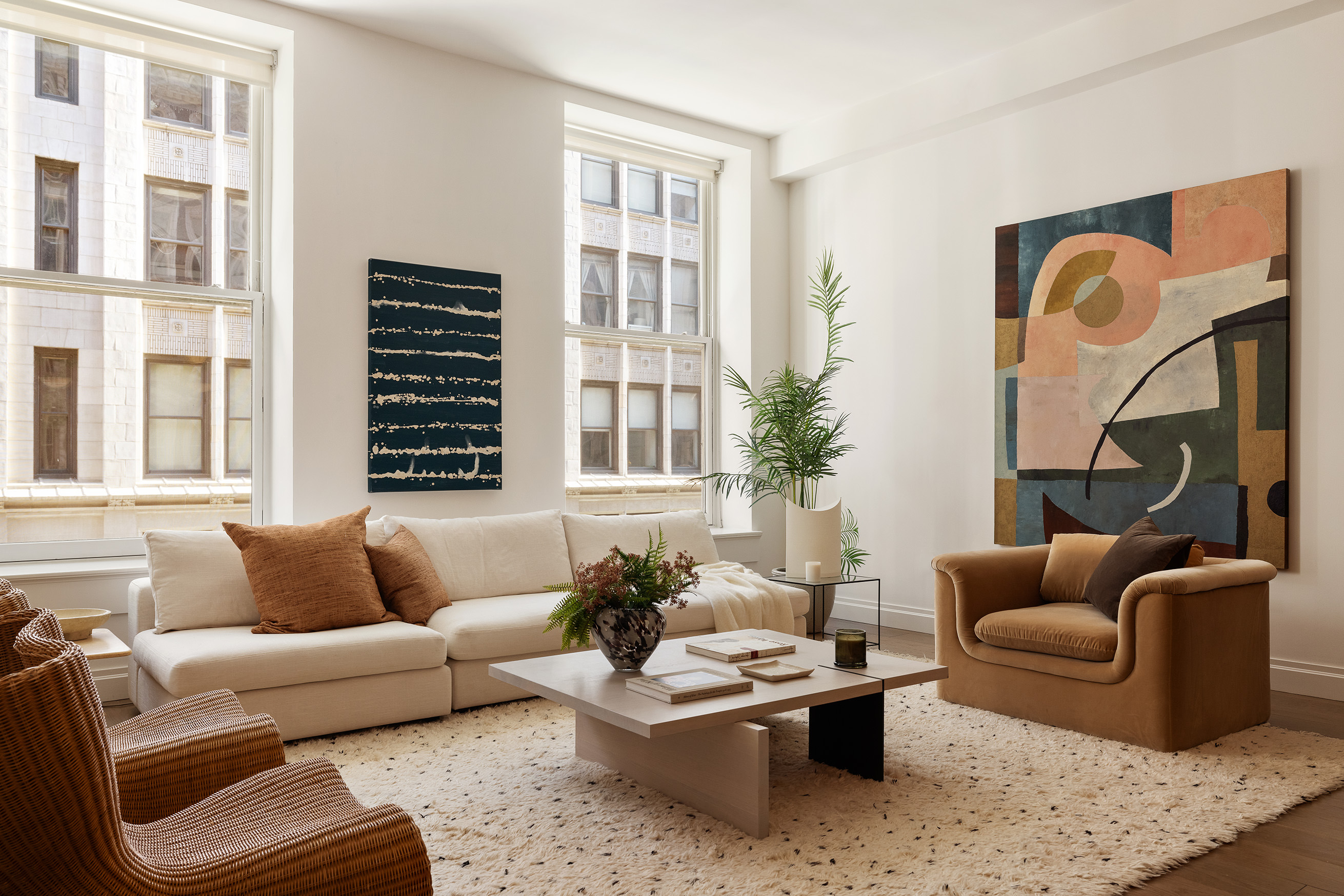 42 East 20th Street, Unit 4AD Manhattan, NY 10003 - Photo 5 of 19 a living room with furniture and a large window