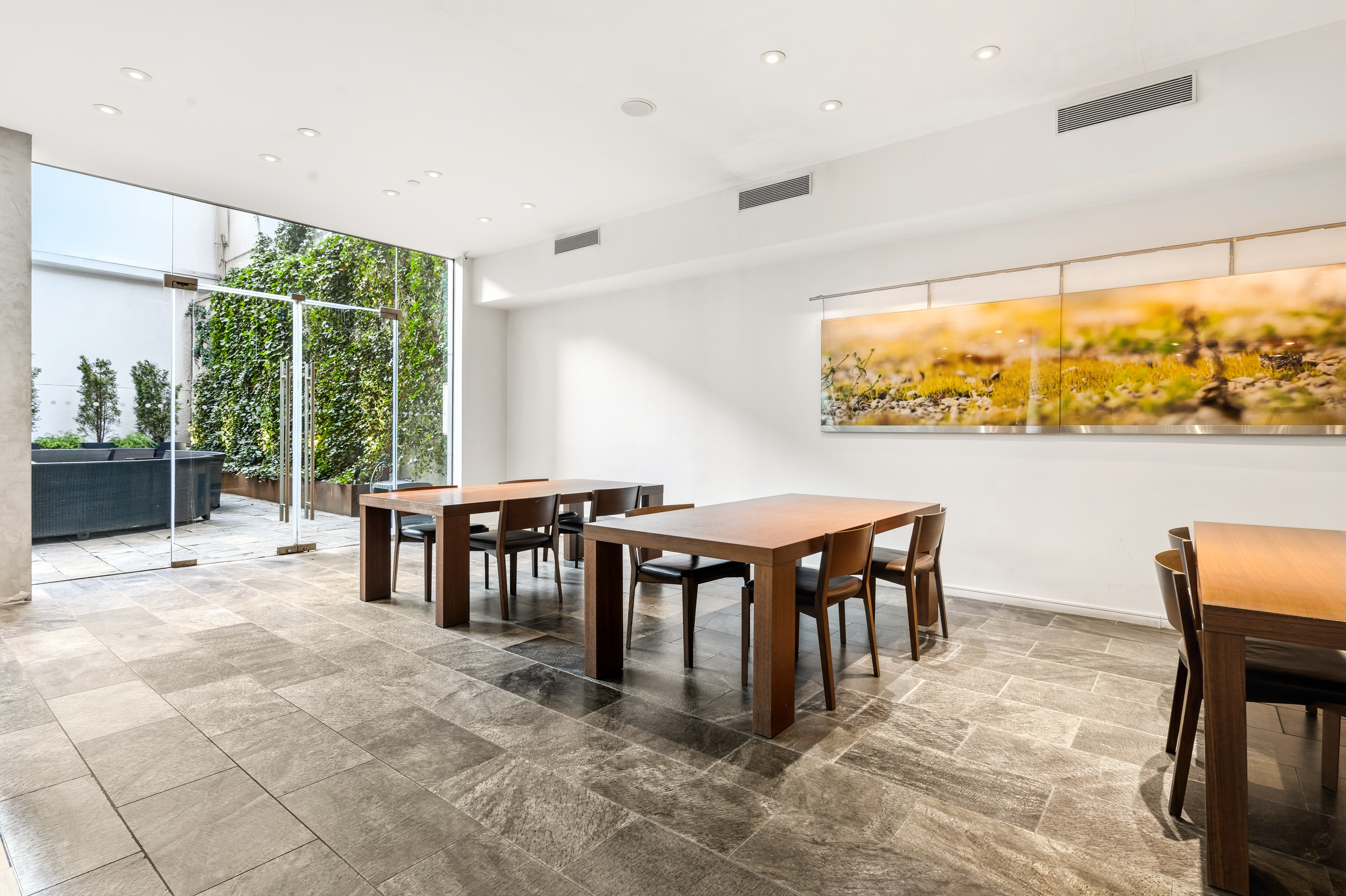 303 East 33rd Street, Unit 5H Manhattan, NY 10016 - Photo 13 of 18 a view of a big dining room with furniture window and outside view