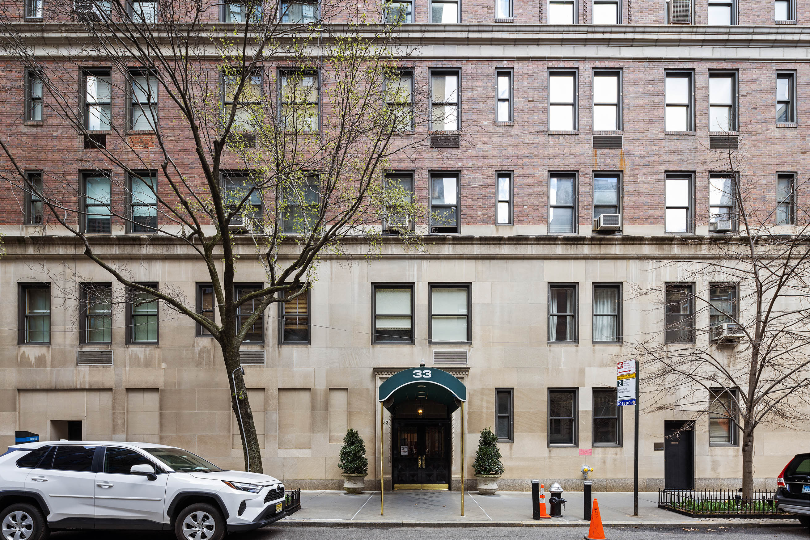 33 East 70th Street, Unit 9C Manhattan, NY 10021 - Photo 10 of 12 a view of a car park in front of a building
