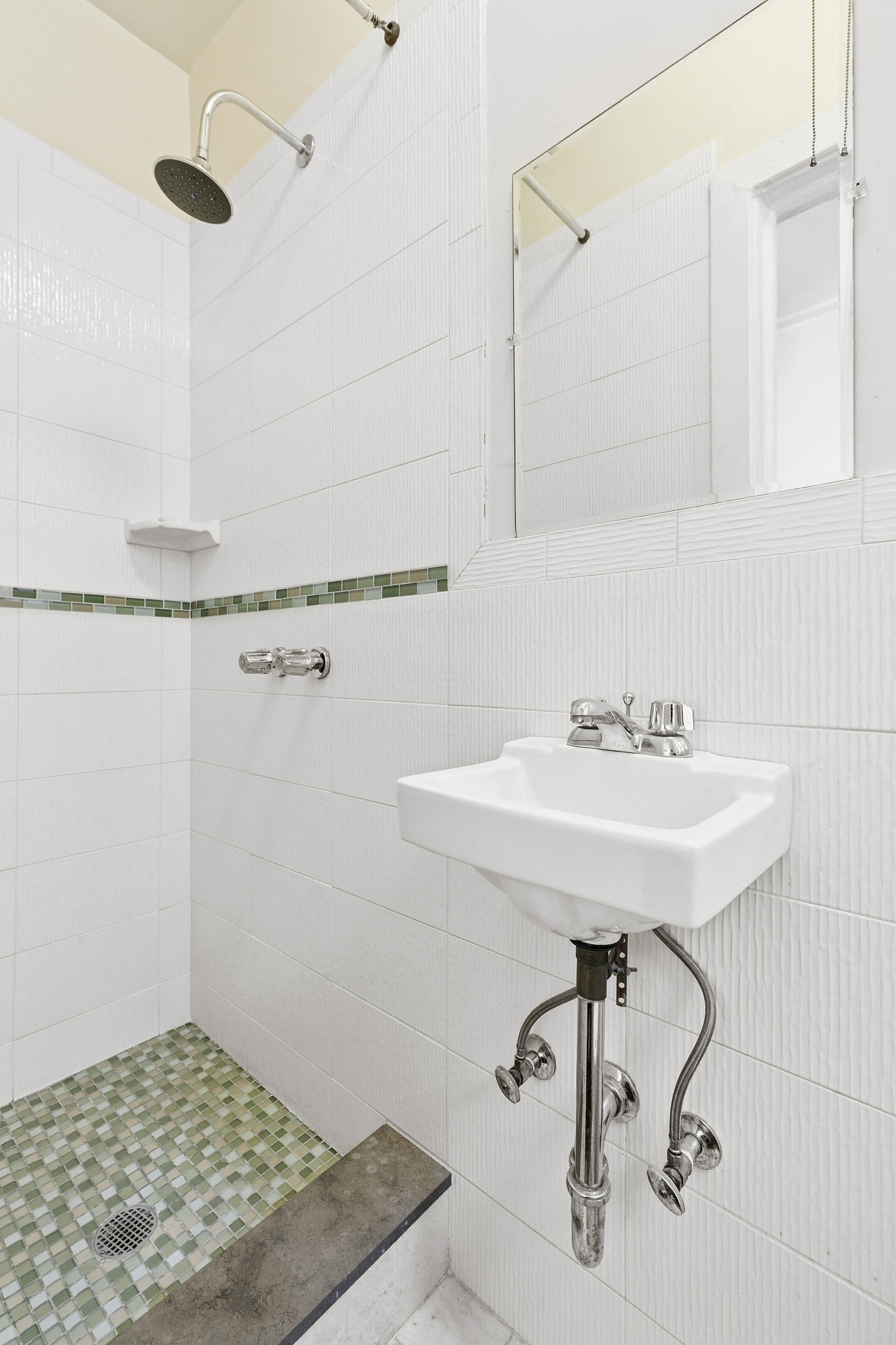 160 West 95th Street, Unit 4A Manhattan, NY 10025 - Photo 8 of 10 a bathroom with a sink and a mirror