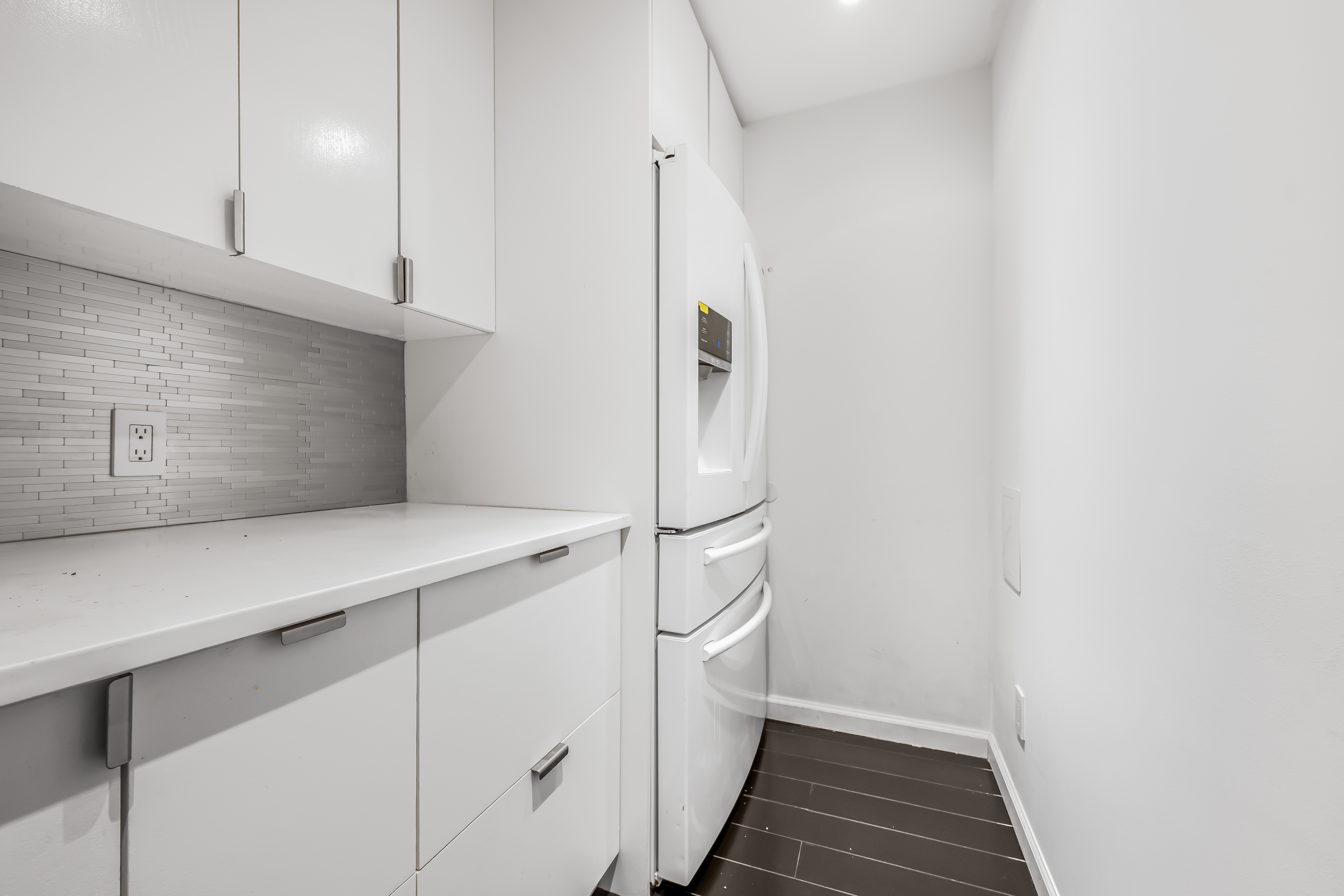 520 East 76th Street, Unit 10H Manhattan, NY 10021 - Photo 16 of 20 a view of storage and utility room with washer and dryer