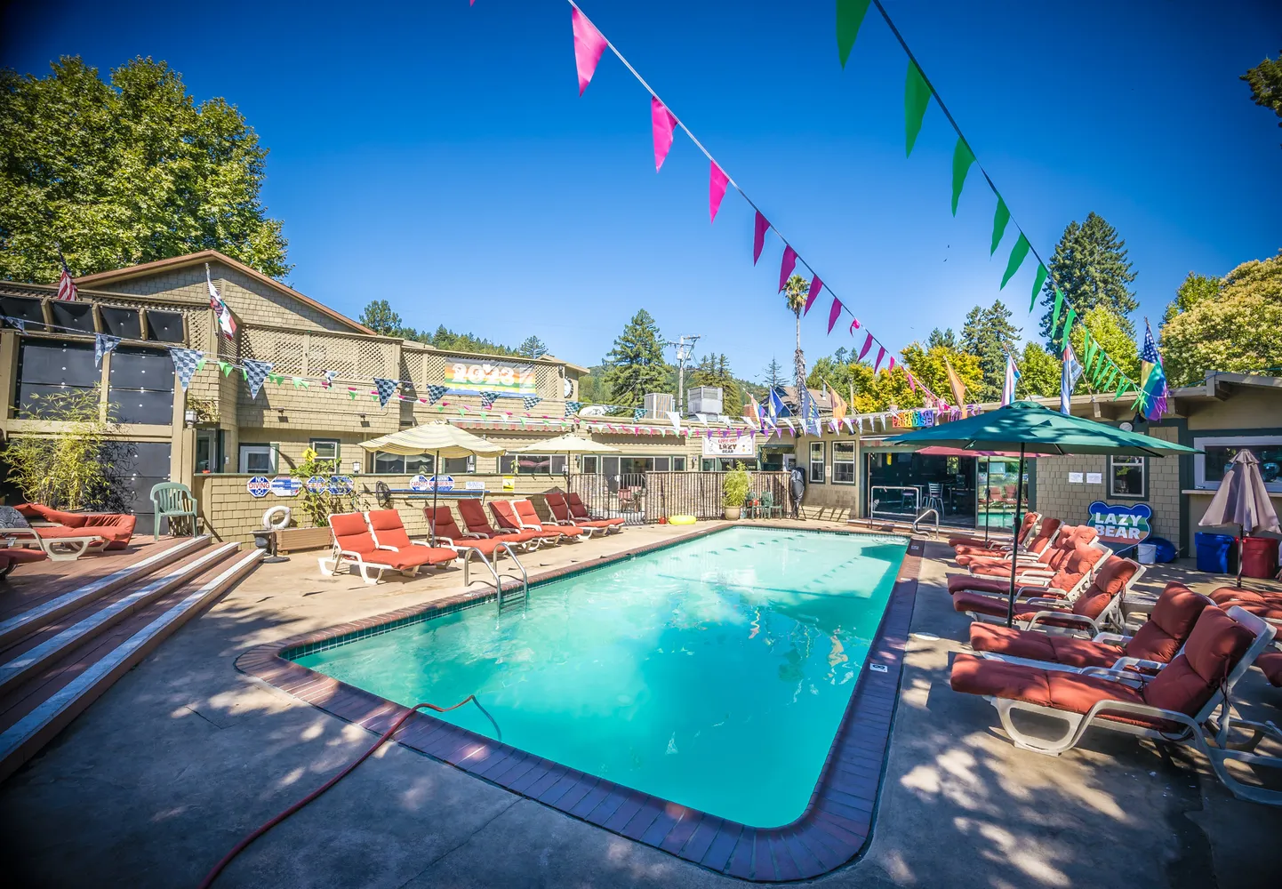 a bedroom with a large bed and a couch