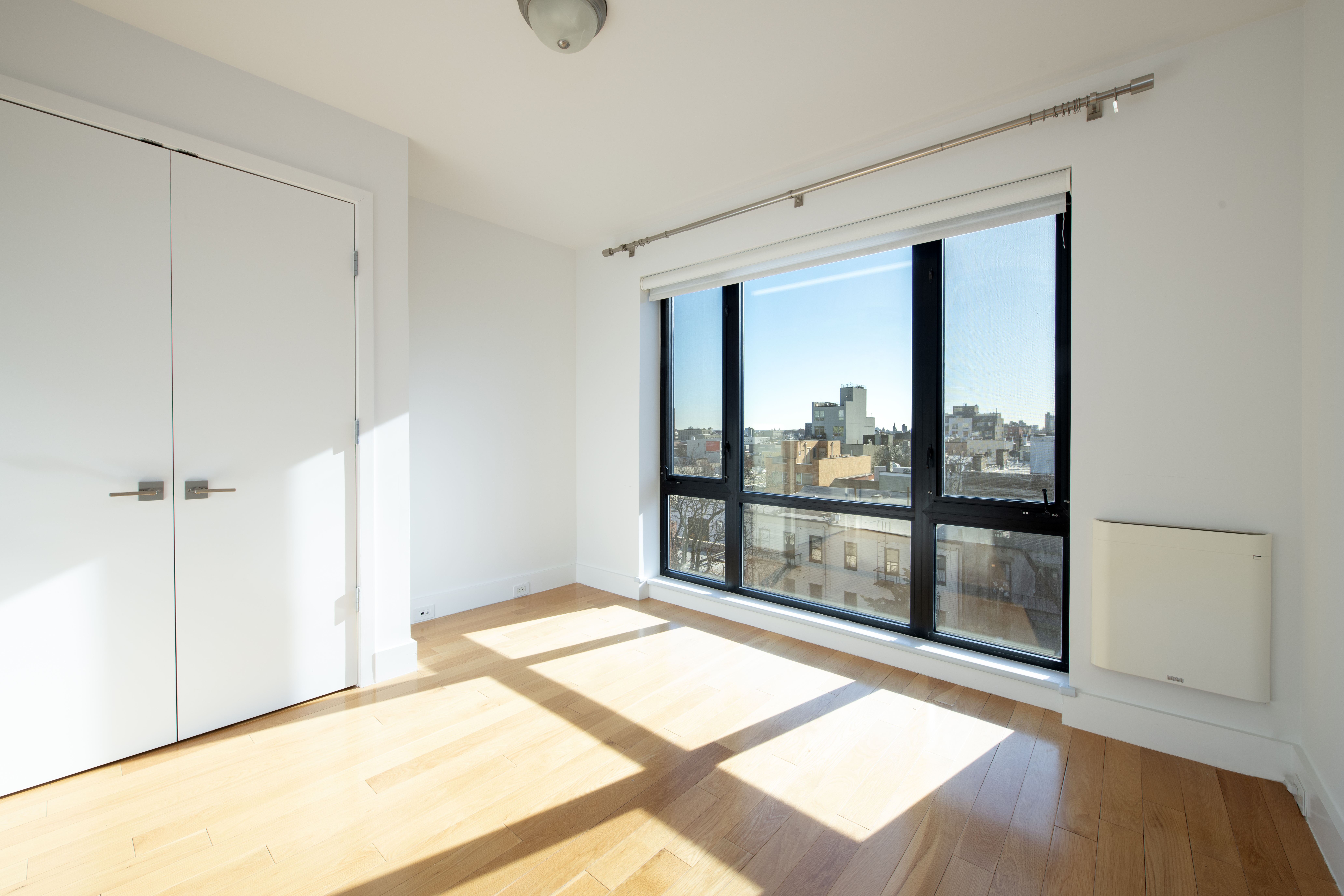62 Box Street, Unit 6A Brooklyn, NY 11222 - Photo 2 of 5 a view of a room with window