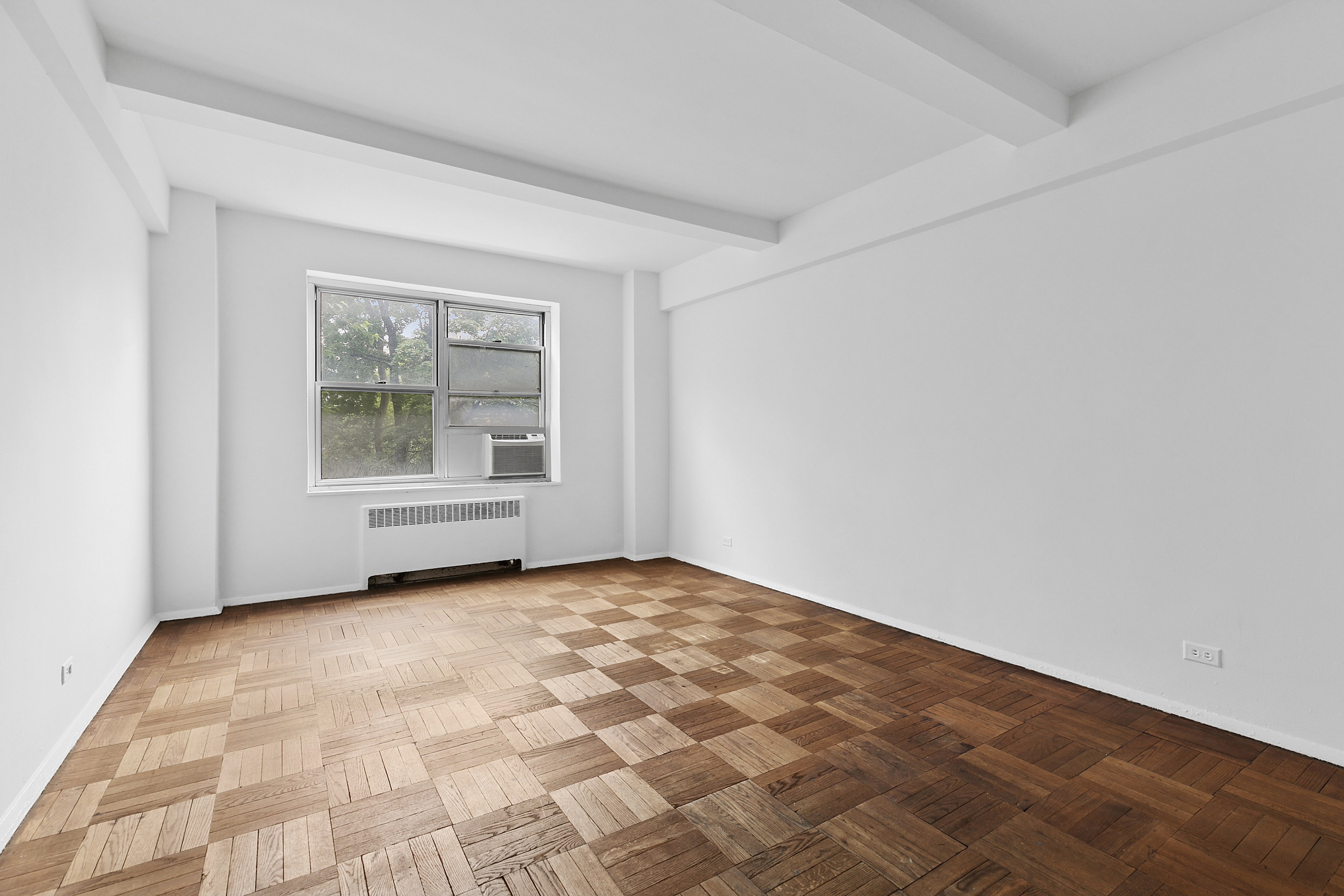 500 Grand Street, Unit C1D Manhattan, NY 10002 - Photo 2 of 8 an empty room with windows
