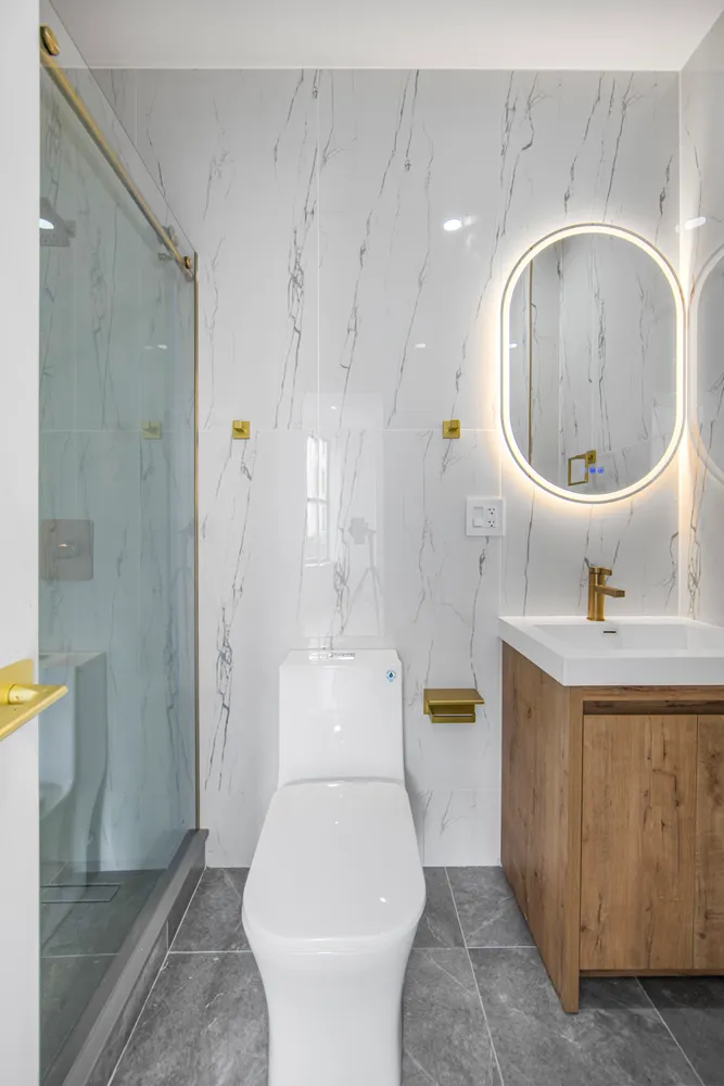 a bathroom with a toilet a sink and bathtub