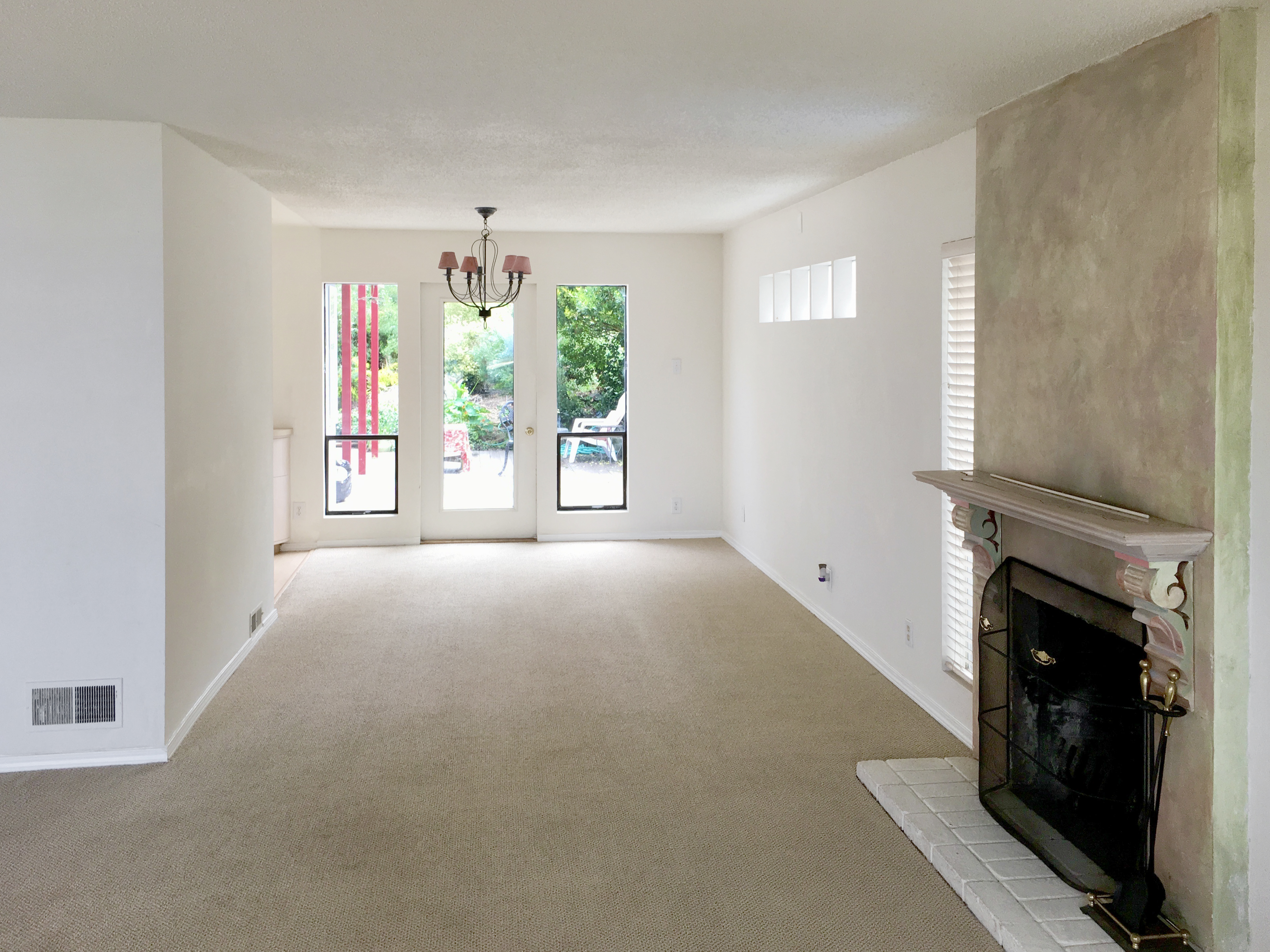 371 Inverness Drive Pacifica, CA 94044 - Photo 5 of 15 wooden floor in an empty room with a fireplace