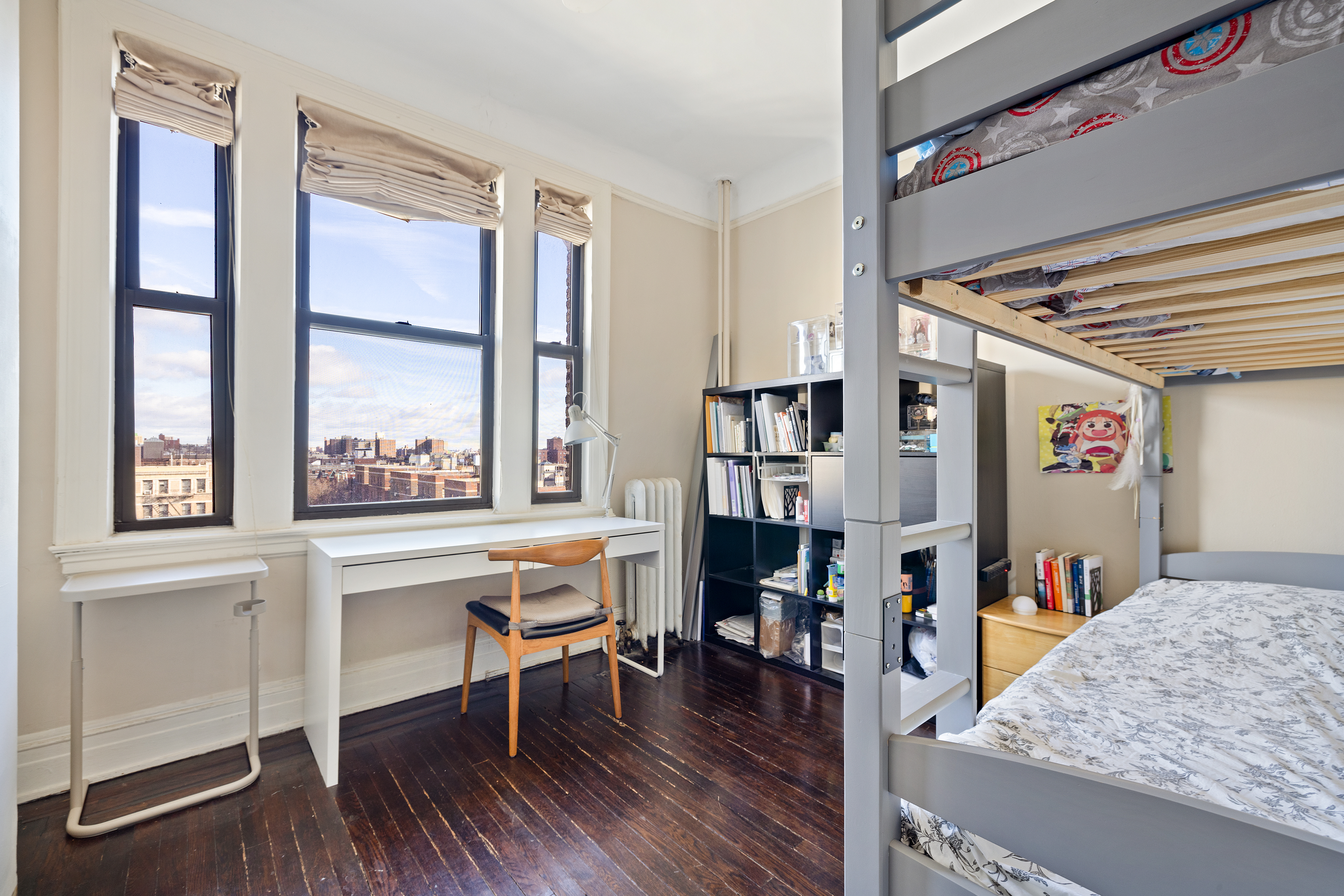 270 Convent Avenue, Unit 8B Manhattan, NY 10031 - Photo 5 of 10 a view of a livingroom with furniture and window