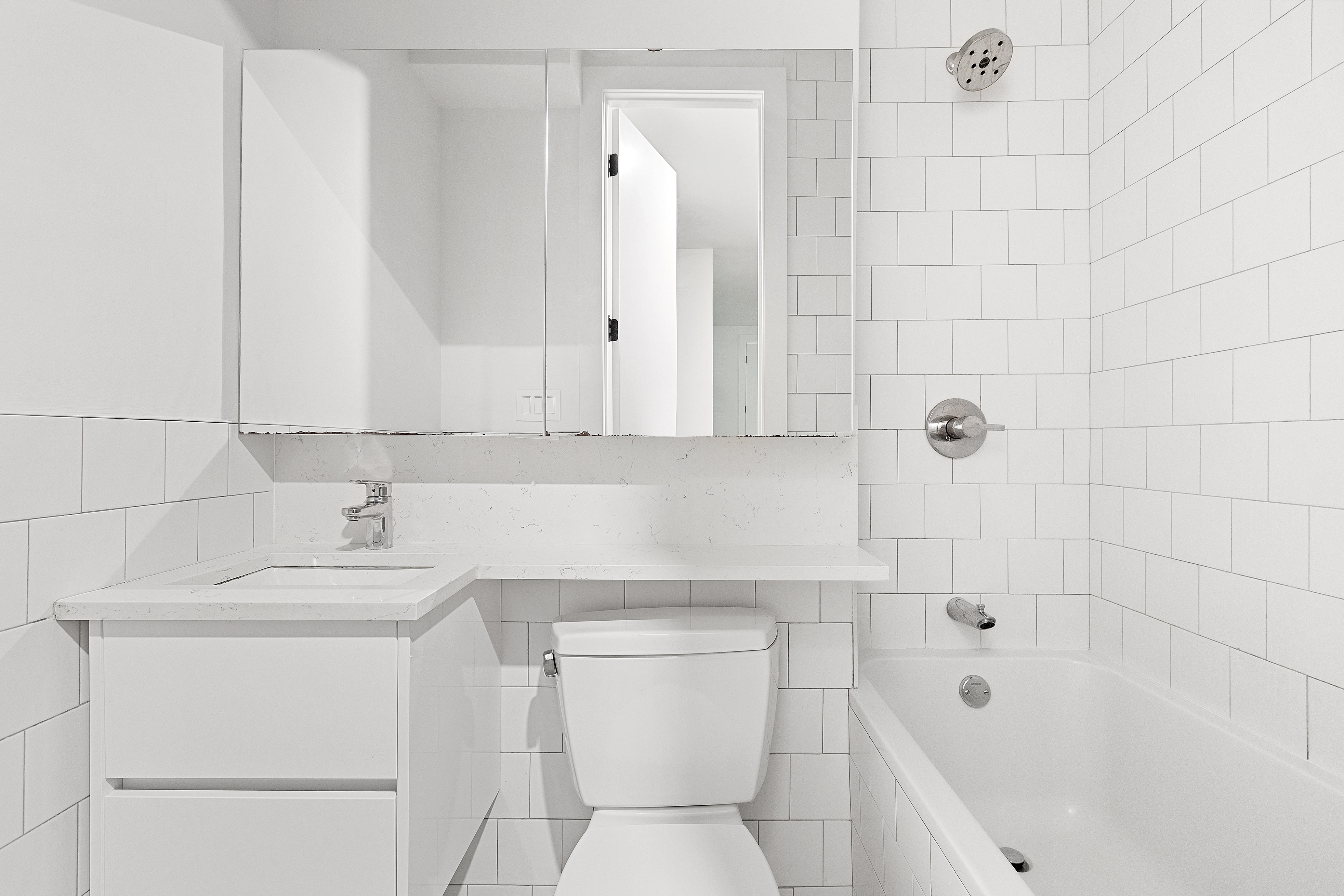 35 Clarkson Avenue, Unit A4 Brooklyn, NY 11226 - Photo 6 of 7 a bathroom with a sink a toilet and shower