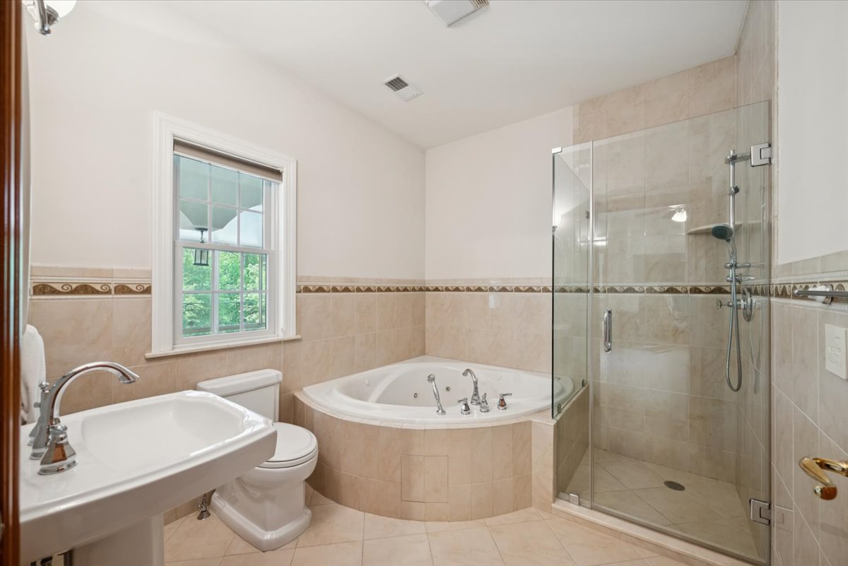 115 Skyline Drive Watchung, NJ 07069 - Photo 60 of 95 a bathroom with a bathtub and a sink