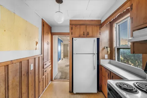 a kitchen with a stove and a sink