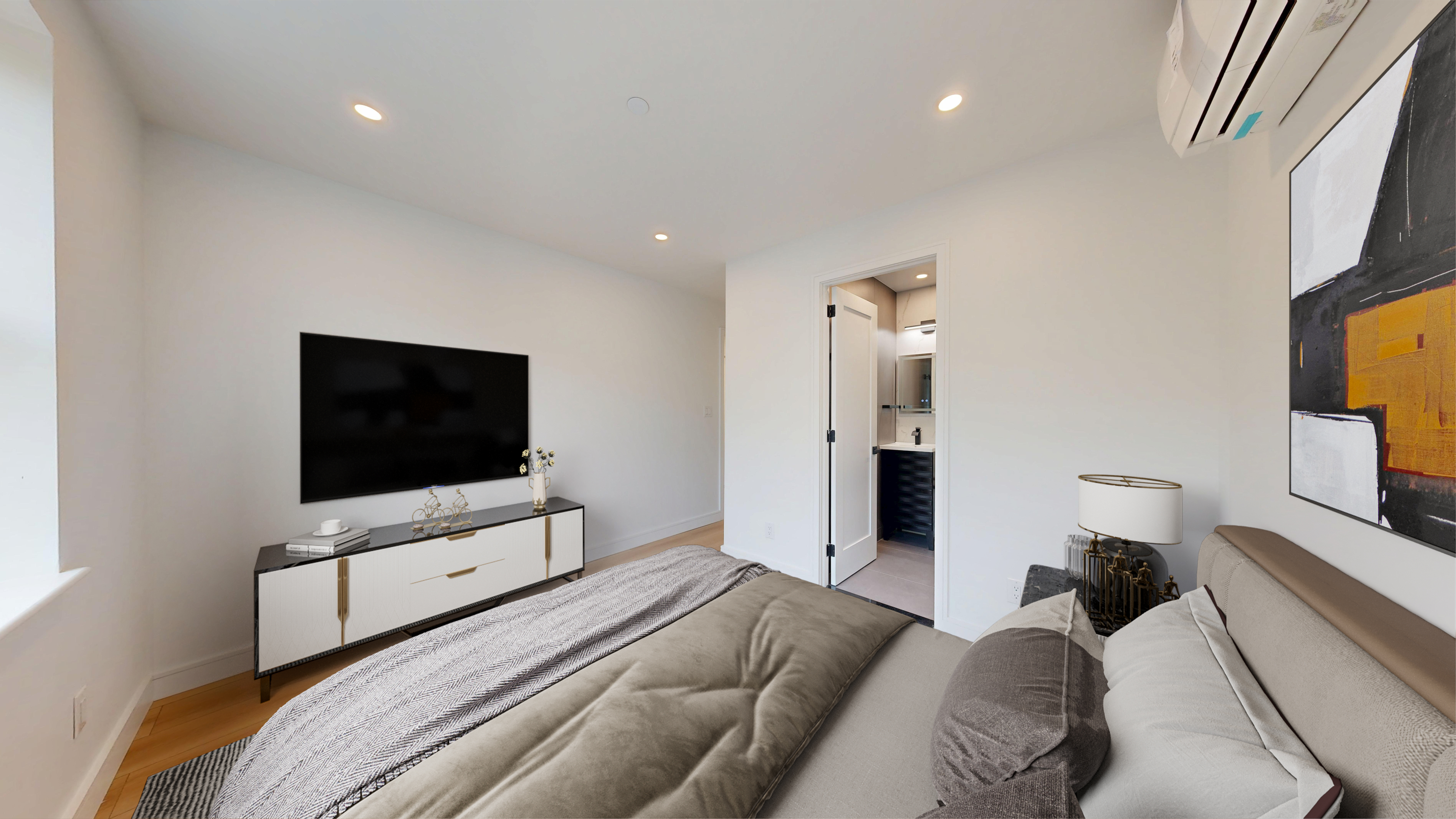 5614 3rd Avenue, Unit 2 Brooklyn, NY 11220 - Photo 5 of 12 a bedroom with a flat screen tv and a couch