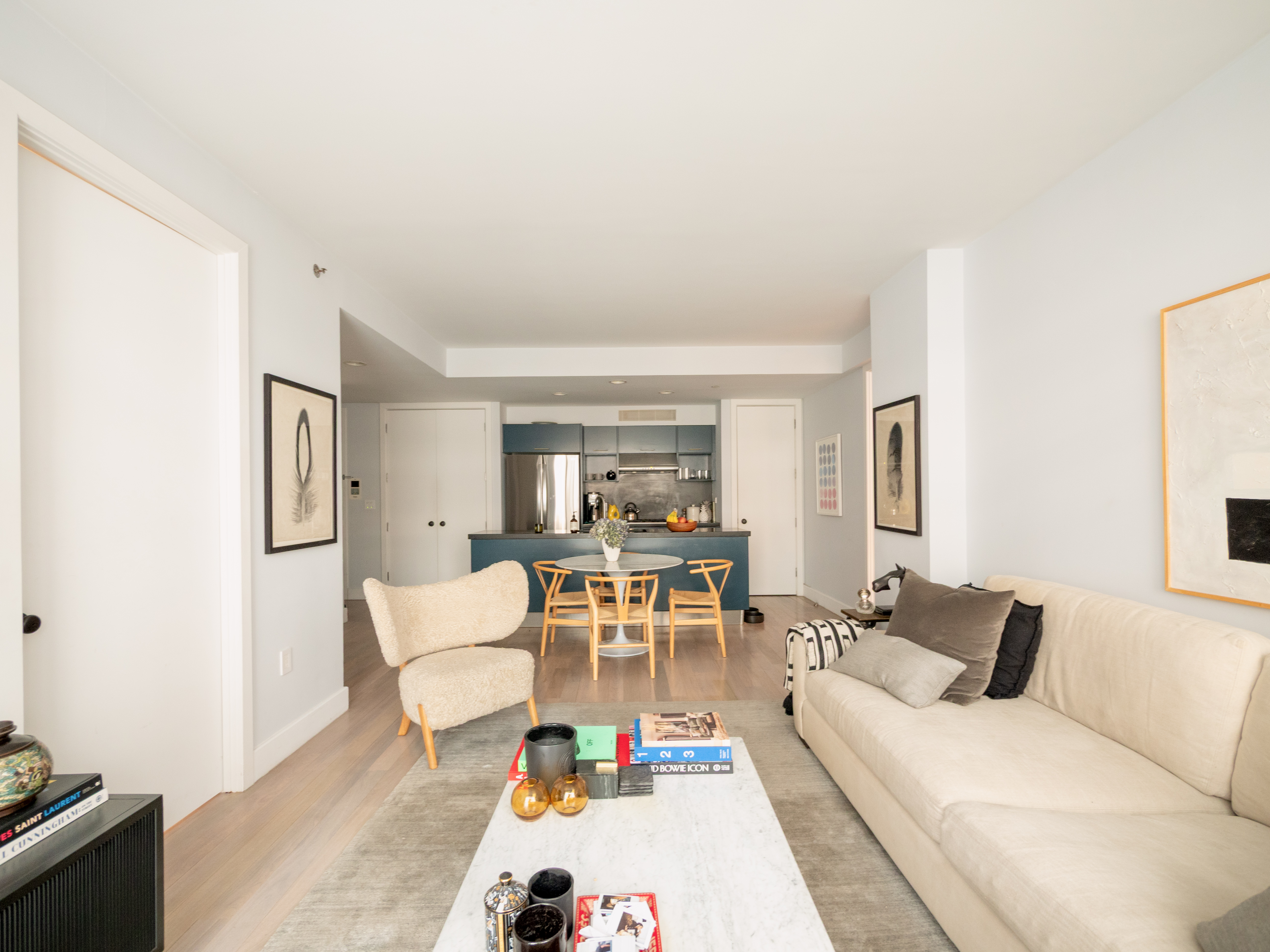 a living room with furniture and a table