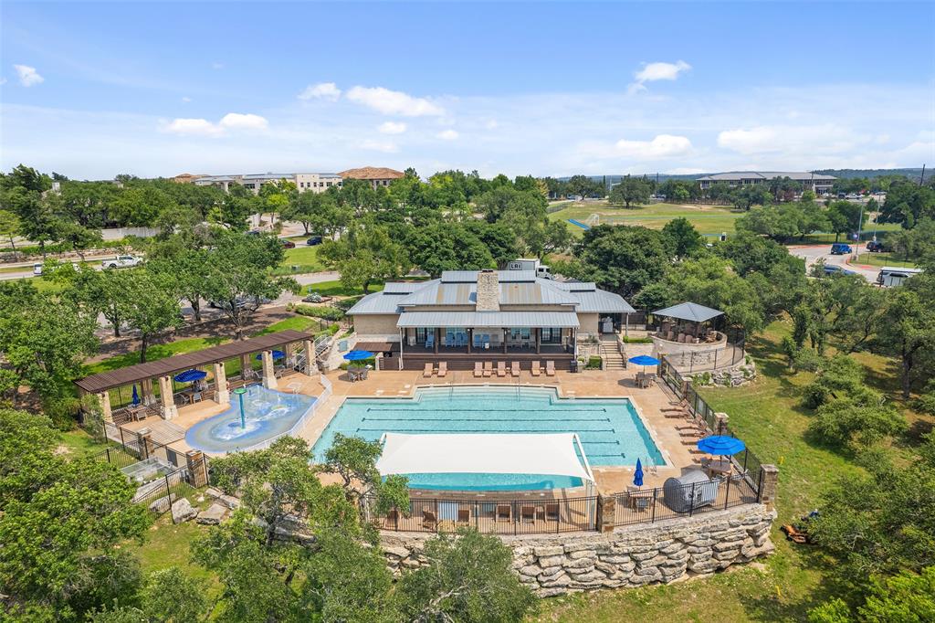 10608 Pointe View Drive Austin, TX 78738 - Photo 32 of 46 an aerial view of a house with a garden
