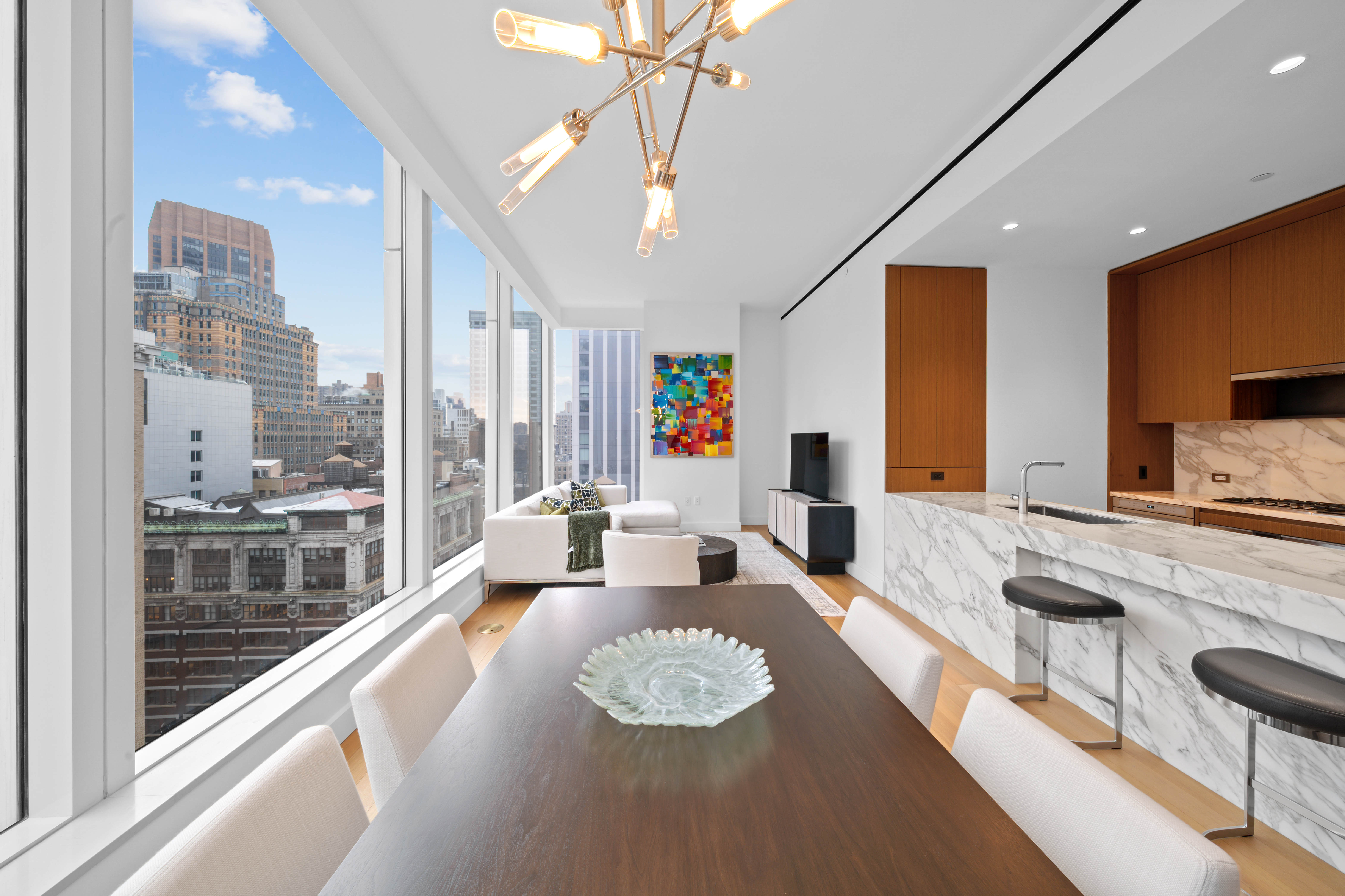15 East 30th Street, Unit 19B Manhattan, NY 10016 - Photo 2 of 40 a large living room with large windows